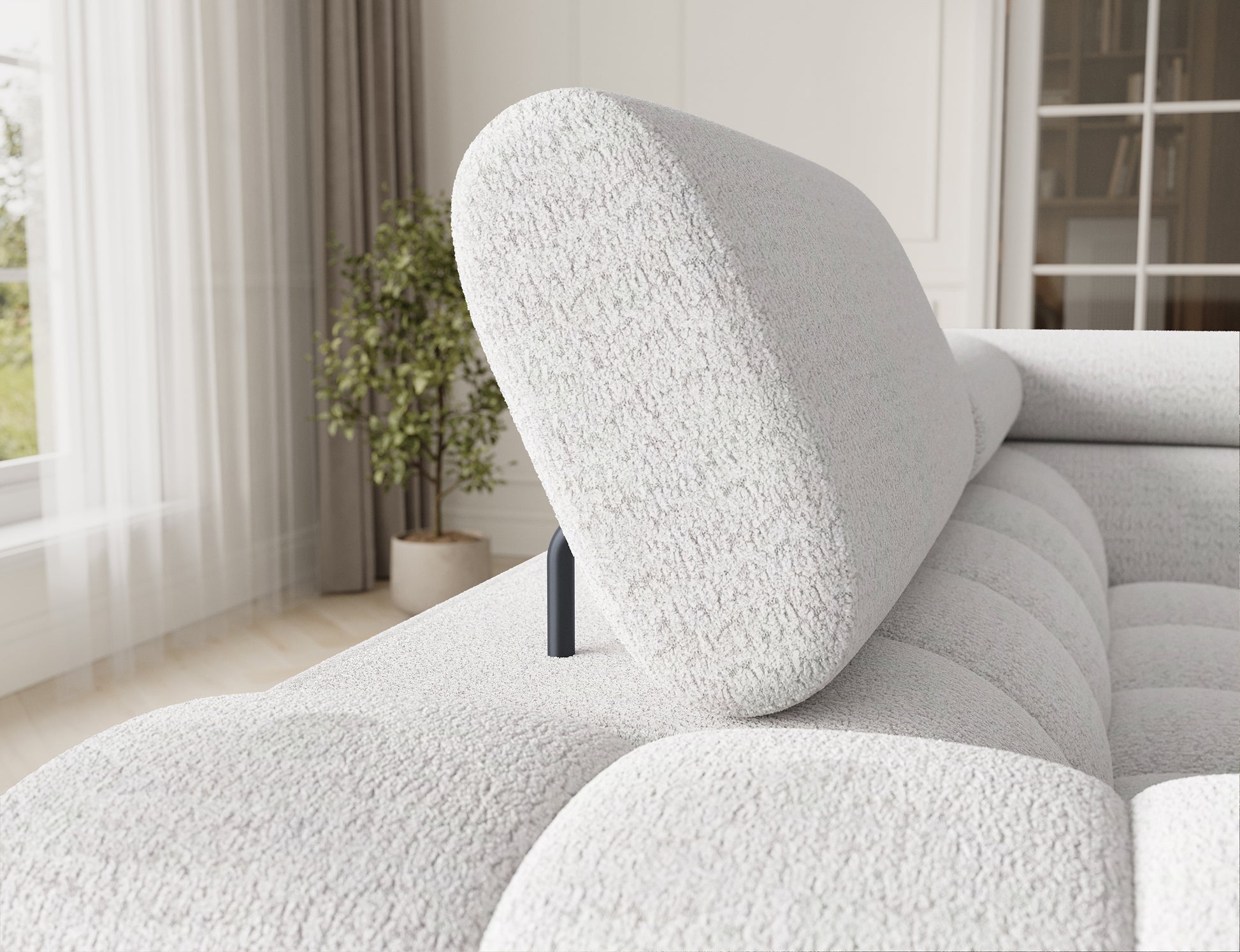 Narożnik Fectory w kolorze białym, z widocznymi, regulowanymi zagłówkami, które zapewniają dodatkowy komfort użytkowania.