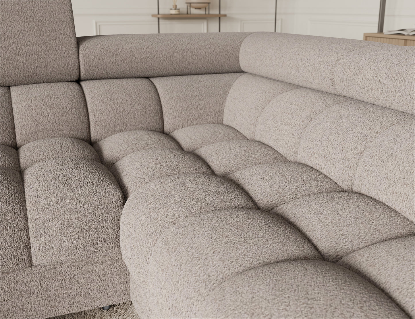 Widok z góry na narożnik Fectory z funkcją spania, na którym widoczne są rozłożone poduszki.