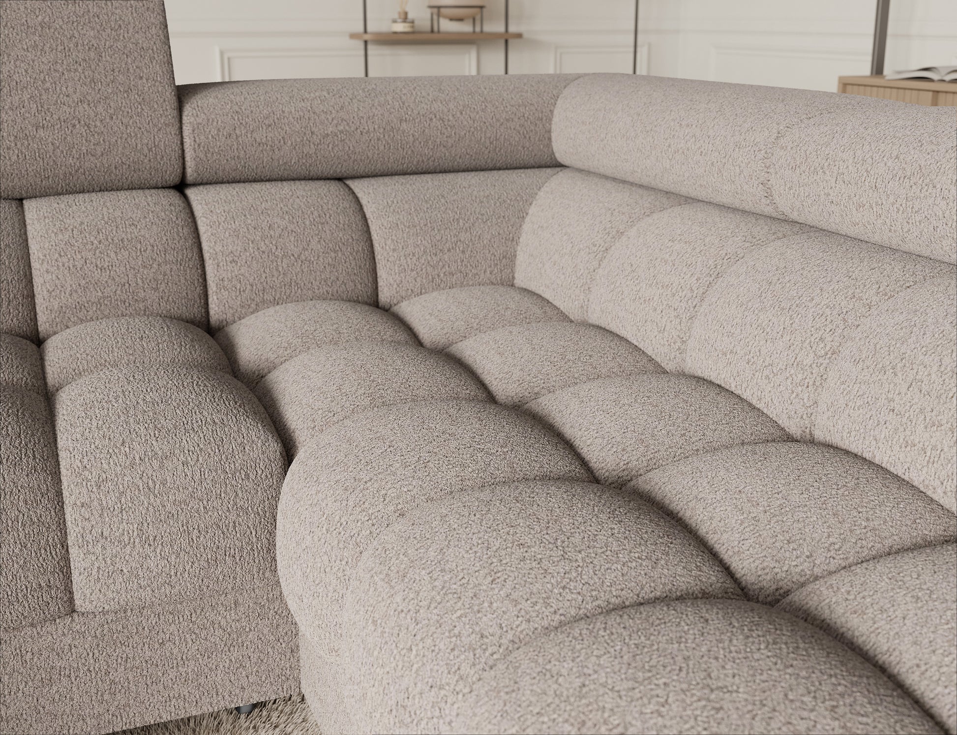 Widok z góry na narożnik Fectory z funkcją spania, na którym widoczne są rozłożone poduszki.