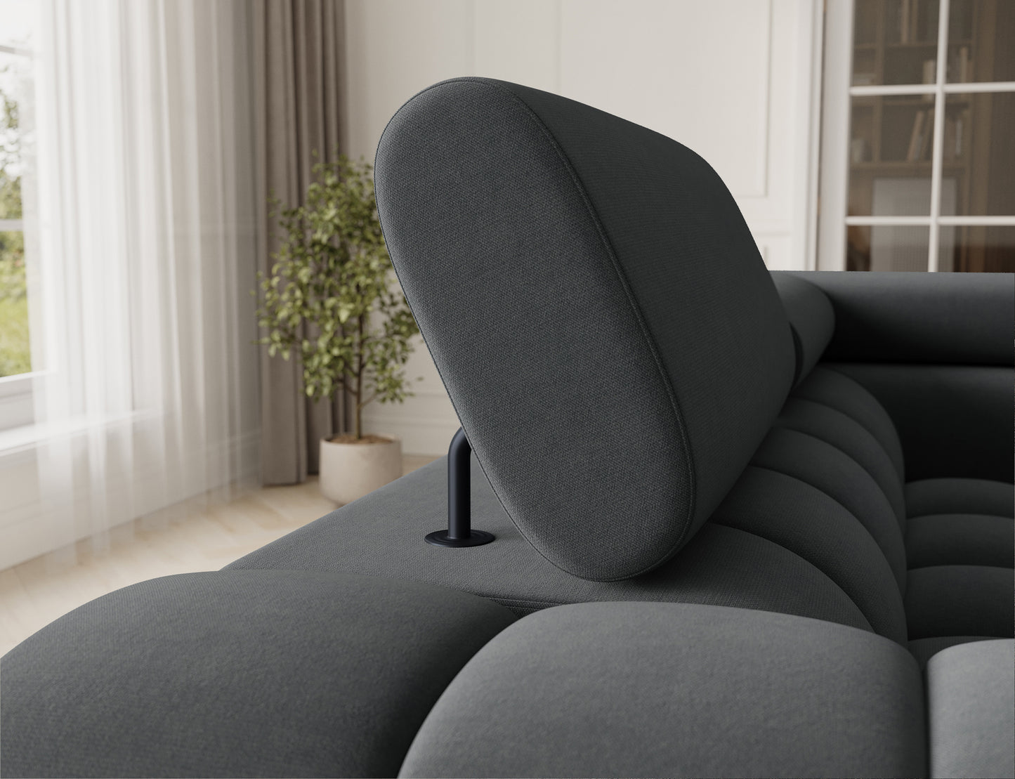 Narożnik Fectory w tkaninie Sola 06 w szarym kolorze, ukazujący precyzyjne pikowanie i nowoczesne wykończenie z metalowymi nogami.