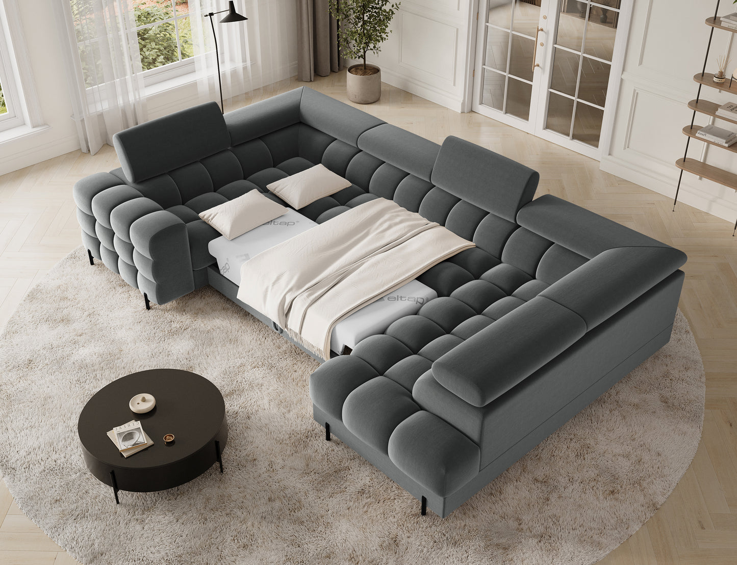 Narożnik w szarej tkaninie Sola 06 z funkcją spania, zapewnia komfortowe warunki do wypoczynku.