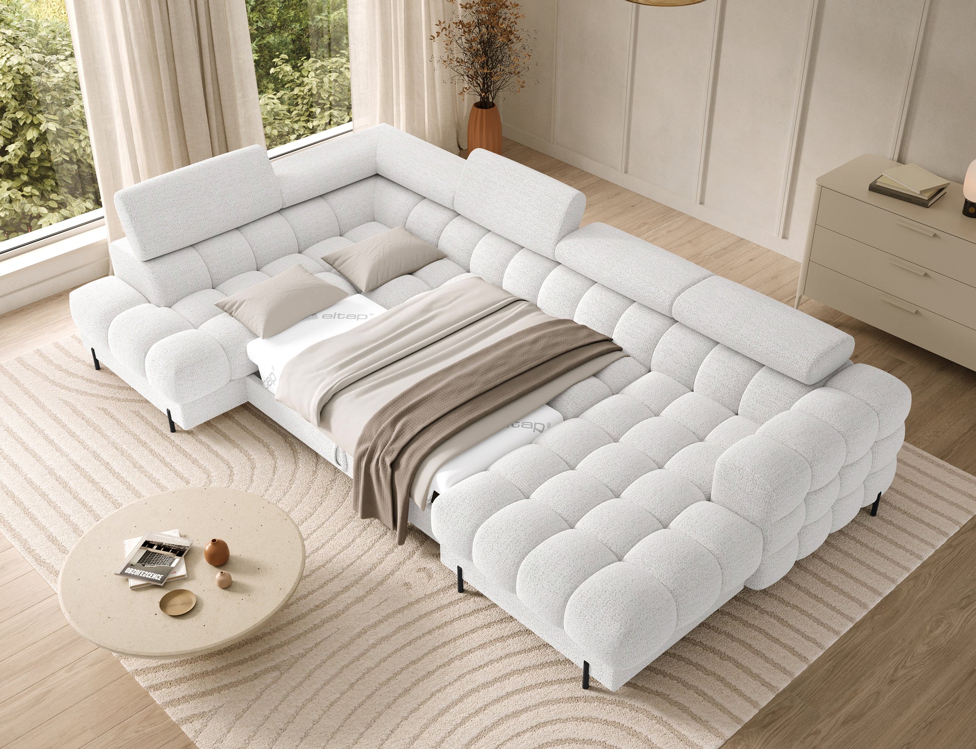 Narożnik Feraria lewy w tkaninie Royal 01 biały rozłożony do spania – funkcja spania z dużą powierzchnią i komfortowym użytkowaniem.