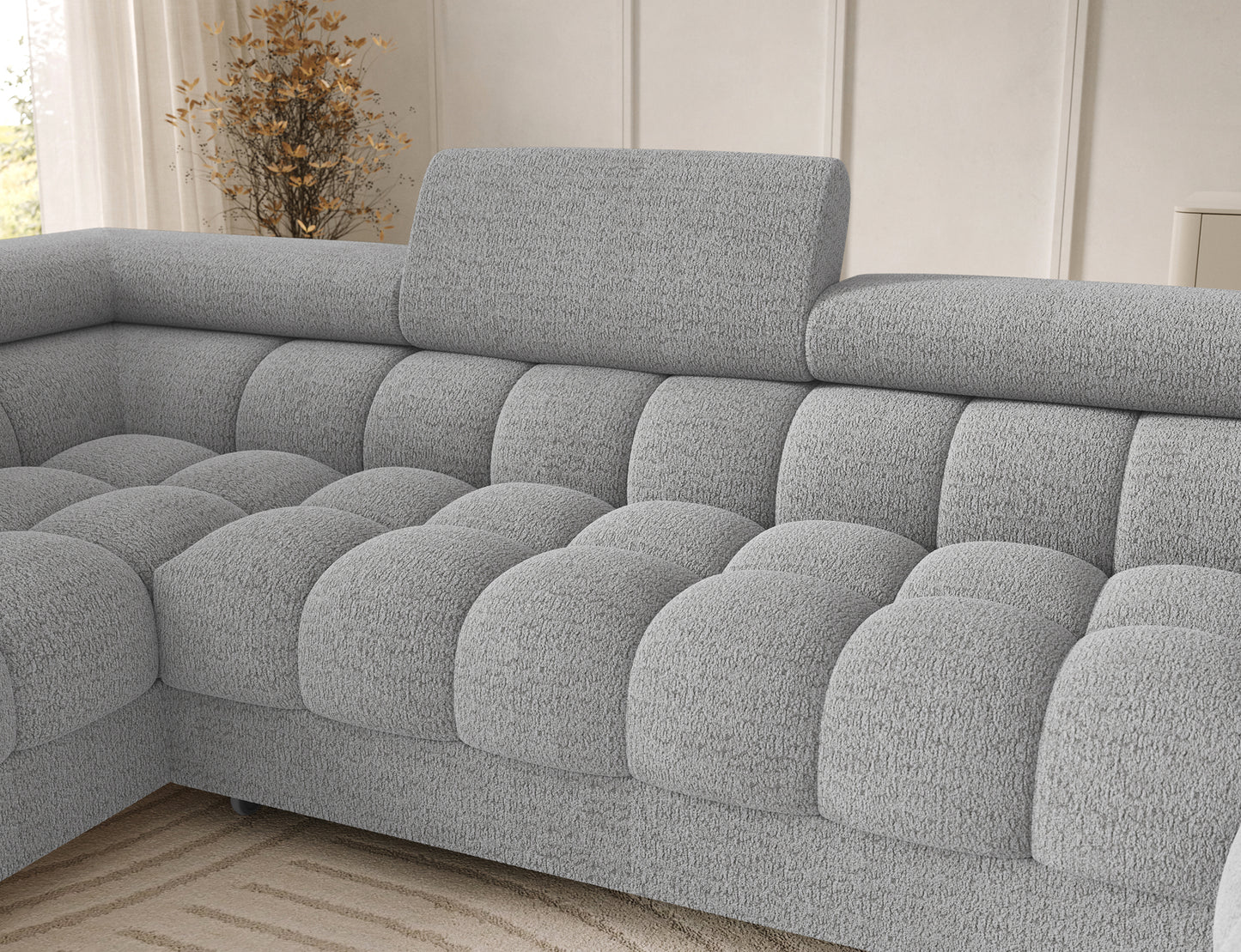 Oparcie narożnika Feraria lewy w tkaninie Royal 03 jasnoszary – wyprofilowane siedzisko z pikowaniem gwarantujące wygodę.