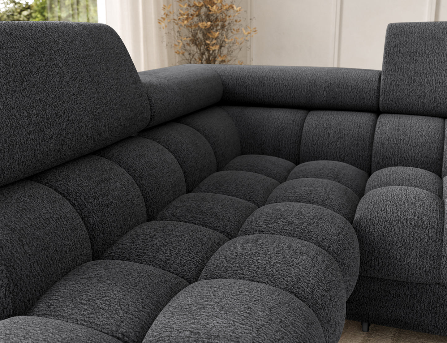 Siedzisko narożnika Feraria lewy w tkaninie Royal 05 ciemnoszary – głębokie pikowania podkreślające luksusowy charakter i wygodę mebla.