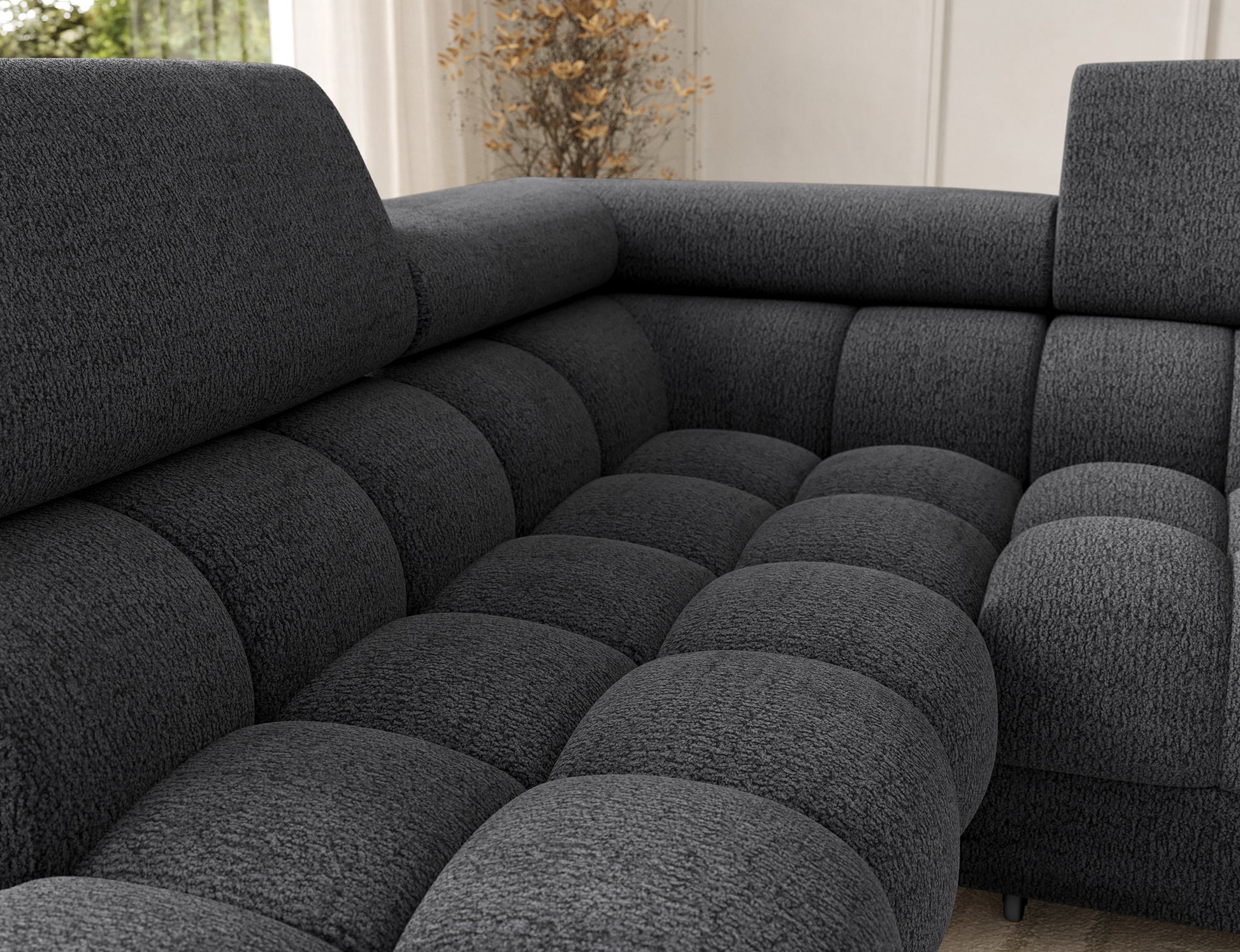 Siedzisko narożnika Feraria lewy w tkaninie Royal 05 ciemnoszary – głębokie pikowania podkreślające luksusowy charakter i wygodę mebla.