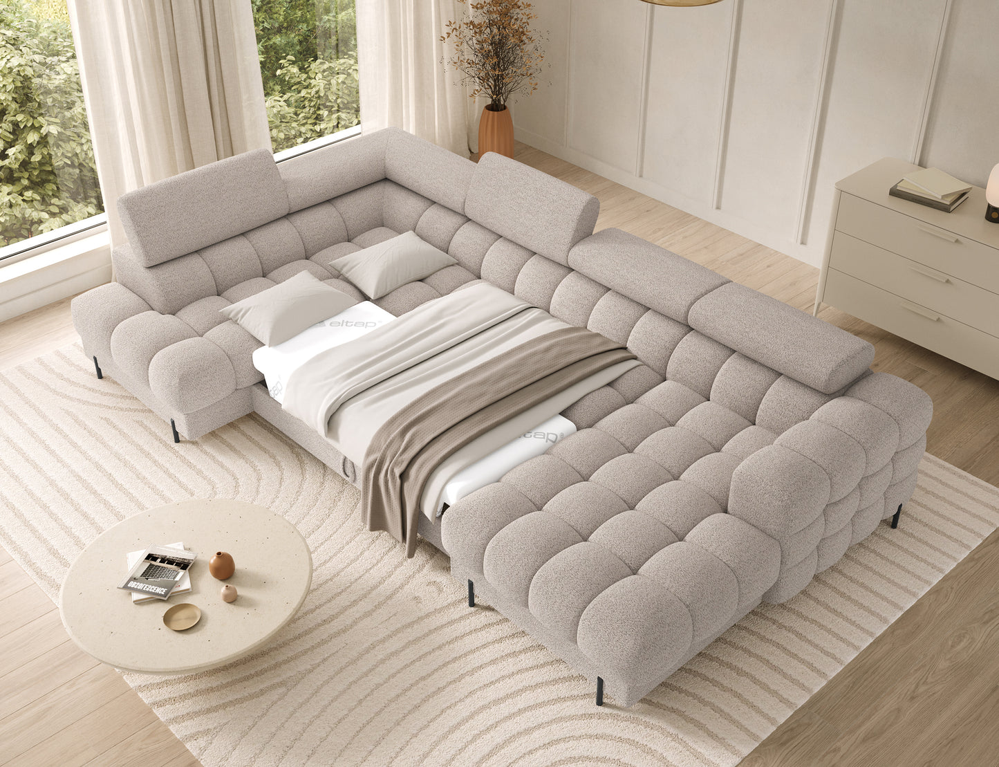 Narożnik Feraria U-Form lewyw tkaninie Royal 18 jasnobeżowy rozłożony do spania – elegancki narożnik z funkcją łóżka i wygodnym posłaniem.