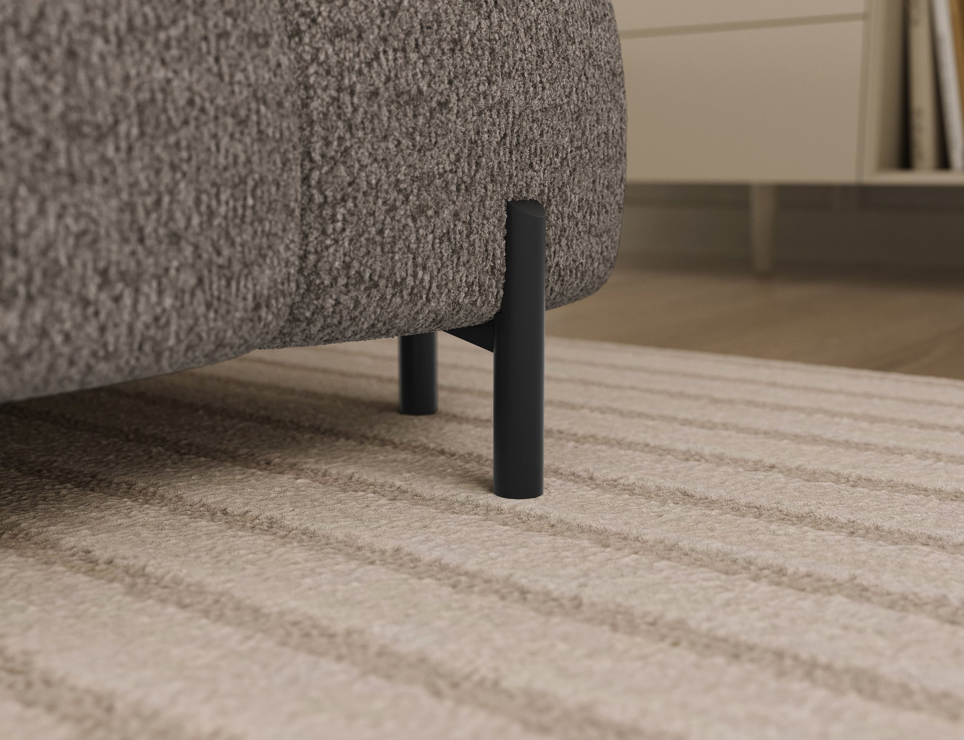 Metalowa noga narożnika Feraria lewy w tkaninie Royal 20 beżowy – stabilna podstawa mebla w nowoczesnym, minimalistycznym stylu.