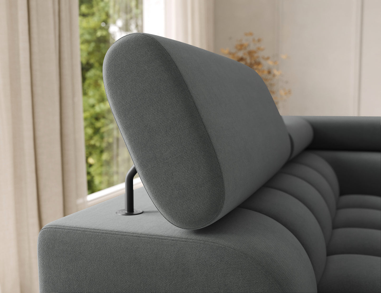 Podłokietnik narożnika Feraria lewy w szarym obiciu Sola 06. Subtelne pikowania podkreślają nowoczesny charakter mebla.