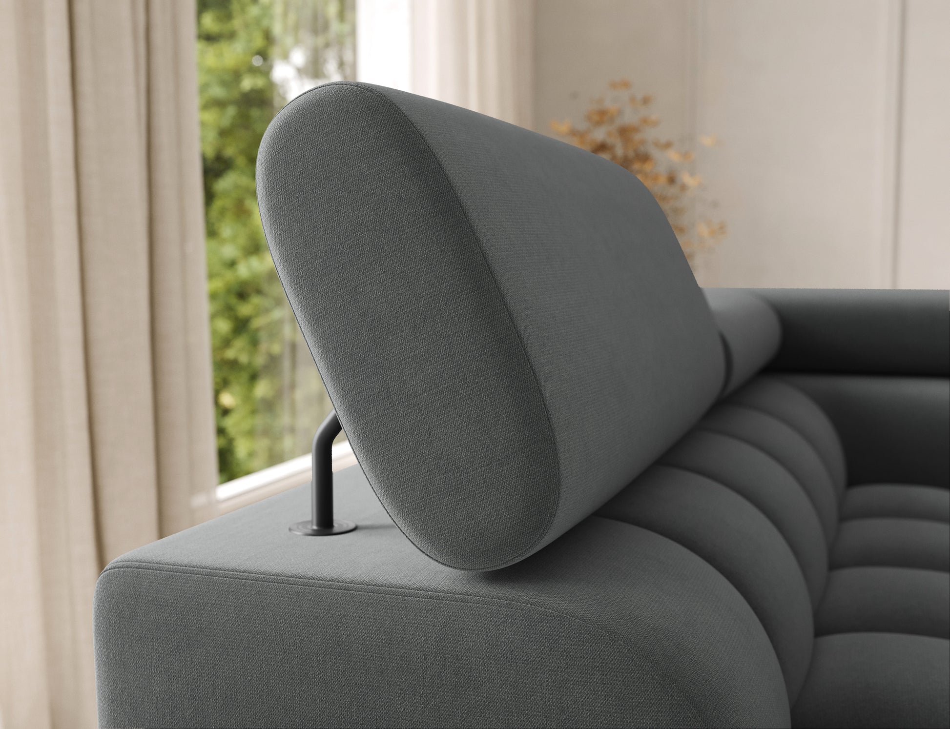 Podłokietnik narożnika Feraria lewy w szarym obiciu Sola 06. Subtelne pikowania podkreślają nowoczesny charakter mebla.