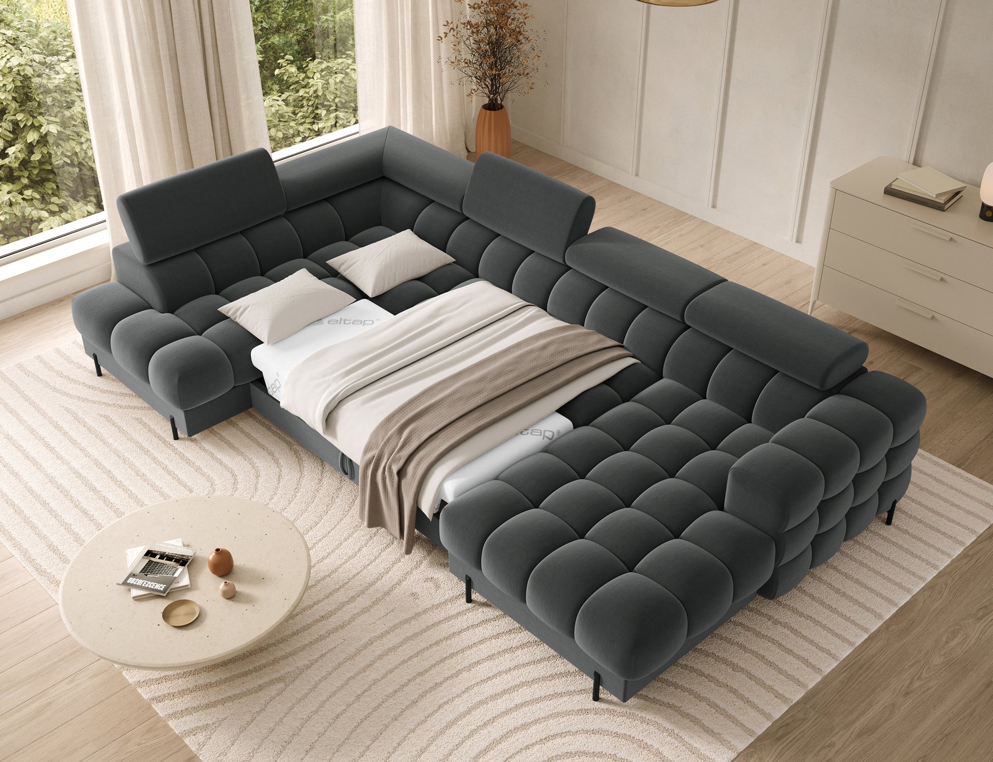 Rozłożony narożnik Feraria lewy w kolorze szarym. Funkcja spania zapewnia dużą powierzchnię do komfortowego wypoczynku.