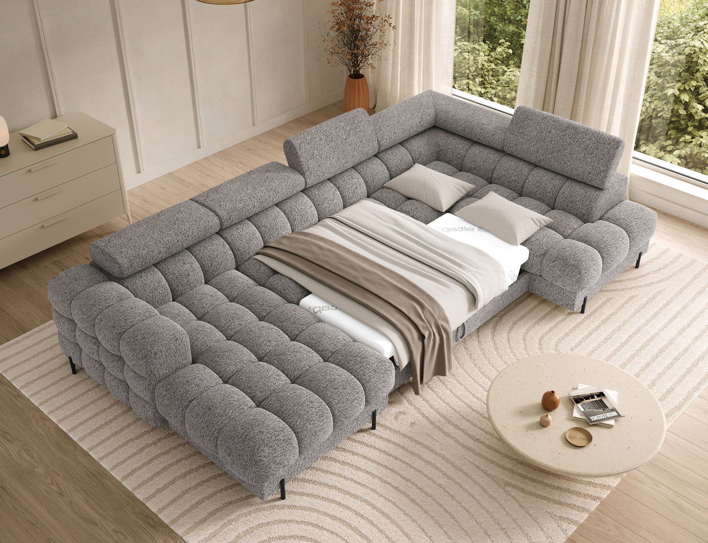 Narożnik Feraria prawy w tkaninie Pellerito 20 ciemnobeżowy rozłożony do spania – duża powierzchnia i wygodna funkcja spania.