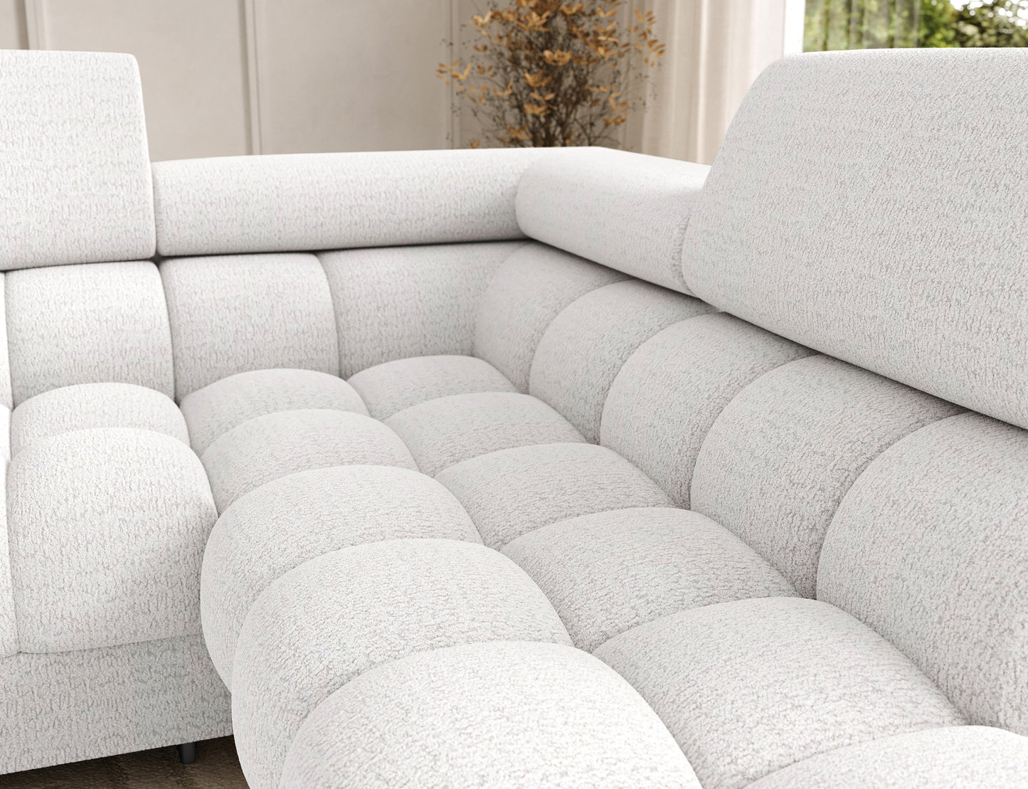 Narożnik Feraria prawy Royal 01 biały – głębokie siedzisko z pikowaną tapicerką, gwarantujące komfort i wyjątkowy styl.