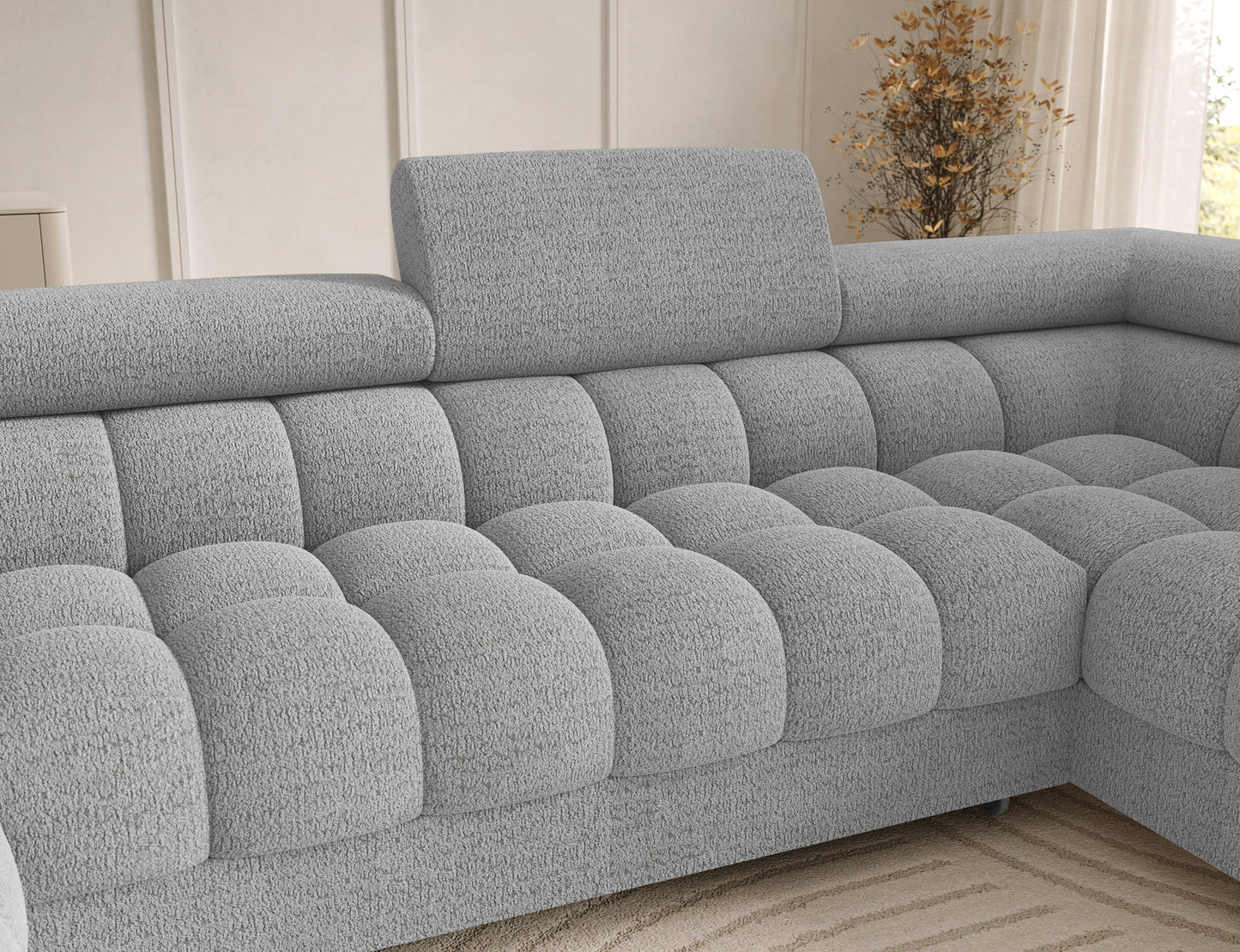 Oparcie narożnika Feraria prawy w tkaninie Royal 03 jasnoszary – ergonomiczne wyprofilowanie i efektowne pikowania dla wygodnego odpoczynku.