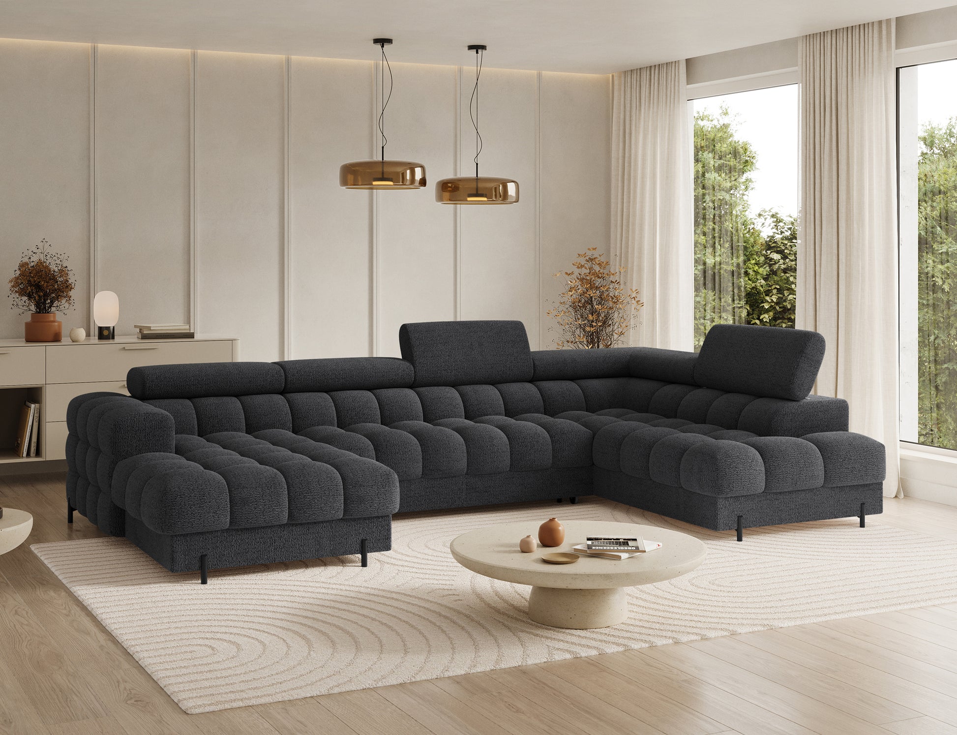 Narożnik Feraria prawy w tkaninie Royal 05 ciemnoszary – ujęcie skos, eksponujące głębokie pikowania i masywną bryłę mebla.