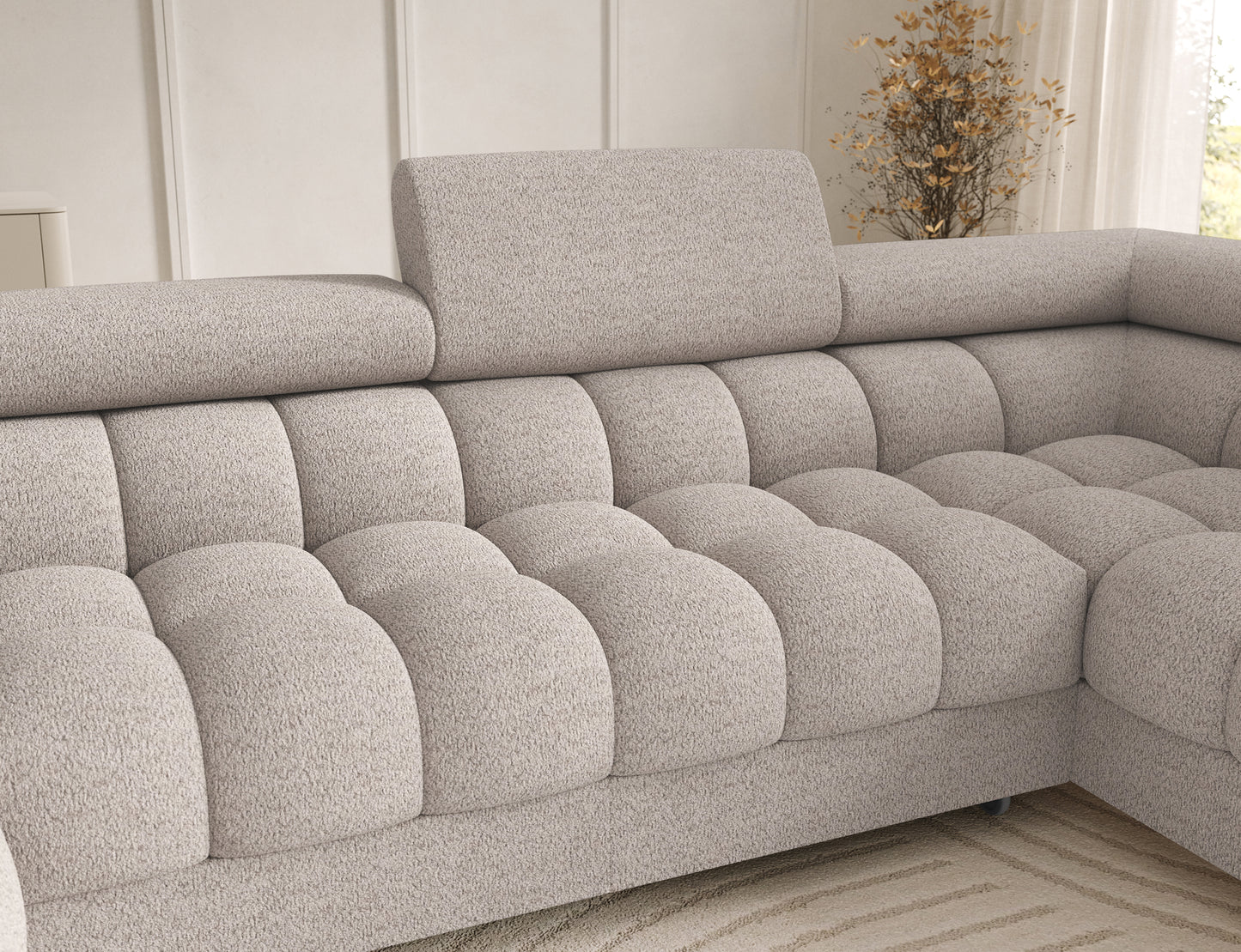 Zbliżenie na oparcie narożnika Feraria U-Form w tkaninie Royal 18 jasnobeżowy – miękkie wypełnienie i eleganckie pikowania tapicerki.