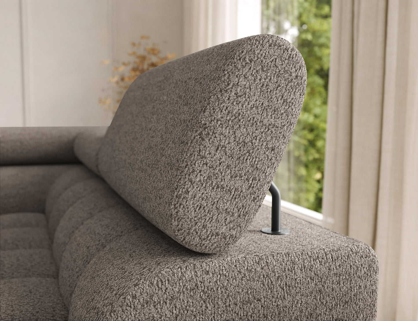 Zbliżenie na regulowany zagłówek narożnika Feraria lewy w tkaninie Royal 20 beżowy – nowoczesny design i wysoki komfort użytkowania.