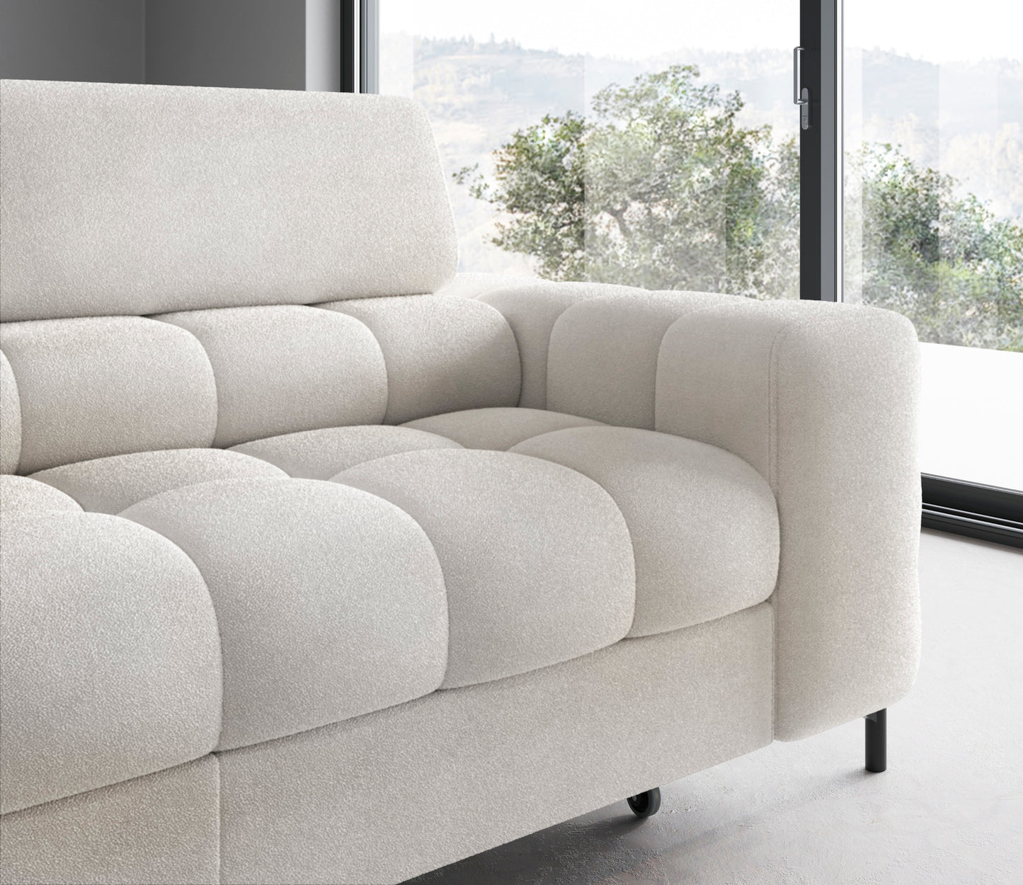 Zbliżenie na prawą stronę lewostronnego narożnika Ferucce w tkaninie Amore 01, z widocznym podłokietnikiem i przeszyciami na siedzisku.