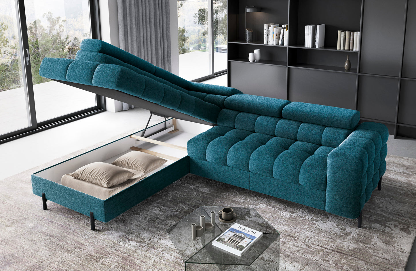 Narożnik Ferucce lewy w tkaninie Amore 40 granatowy z uniesionym szezlongiem, prezentujący pojemnik na pościel z poduszkami w eleganckim wnętrzu.