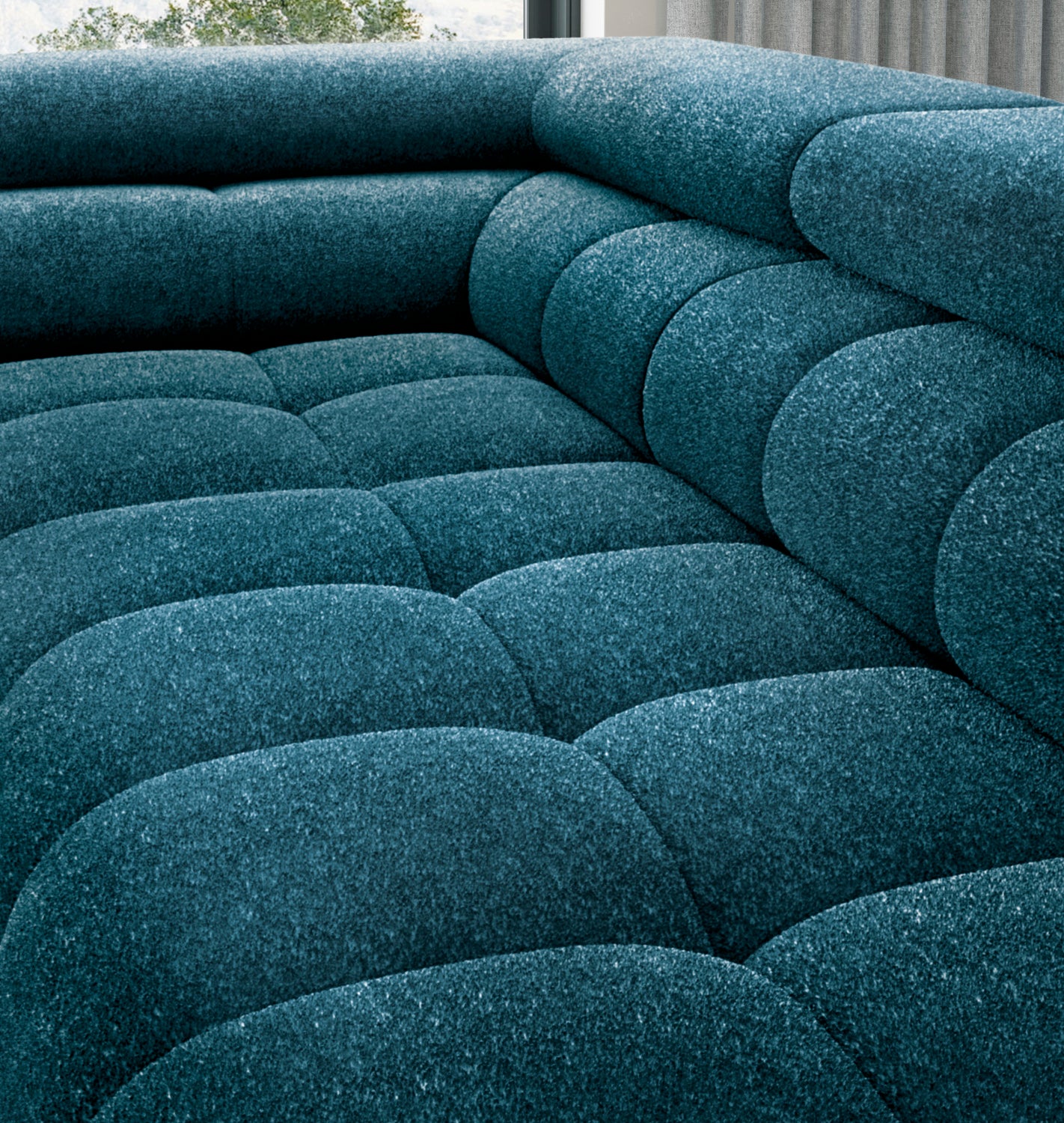 Zbliżenie na siedzisko i oparcie narożnika Ferucce w tkaninie Amore 40 granatowy, eksponujące pikowania i miękką strukturę materiału.