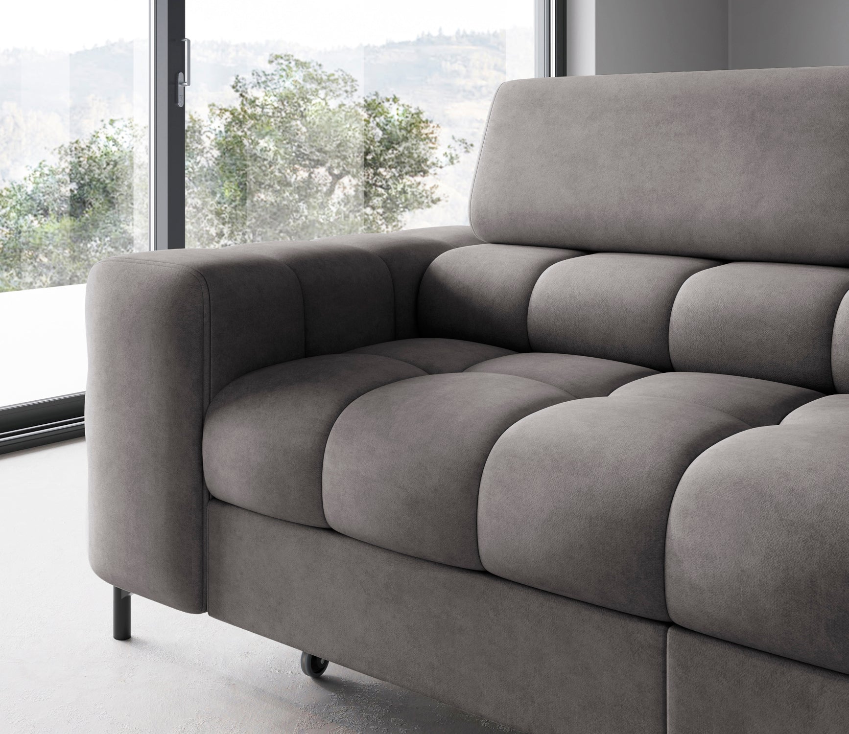 Nowoczesne, zaokrąglone podłokietniki i miękkie poduszki narożnika Ferucce w tkaninie Aura 04 – połączenie stylu i wygody.