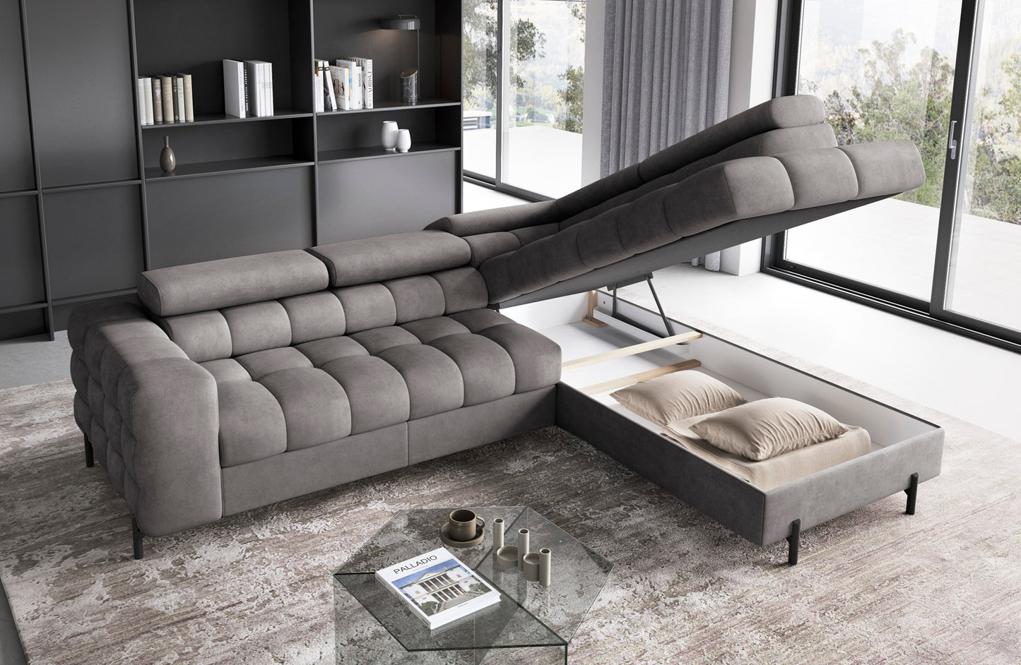 Otwarty pojemnik na pościel narożnika Ferucce w tkaninie Aura 04 szary, z uniesionym szezlongiem, w nowoczesnym salonie.