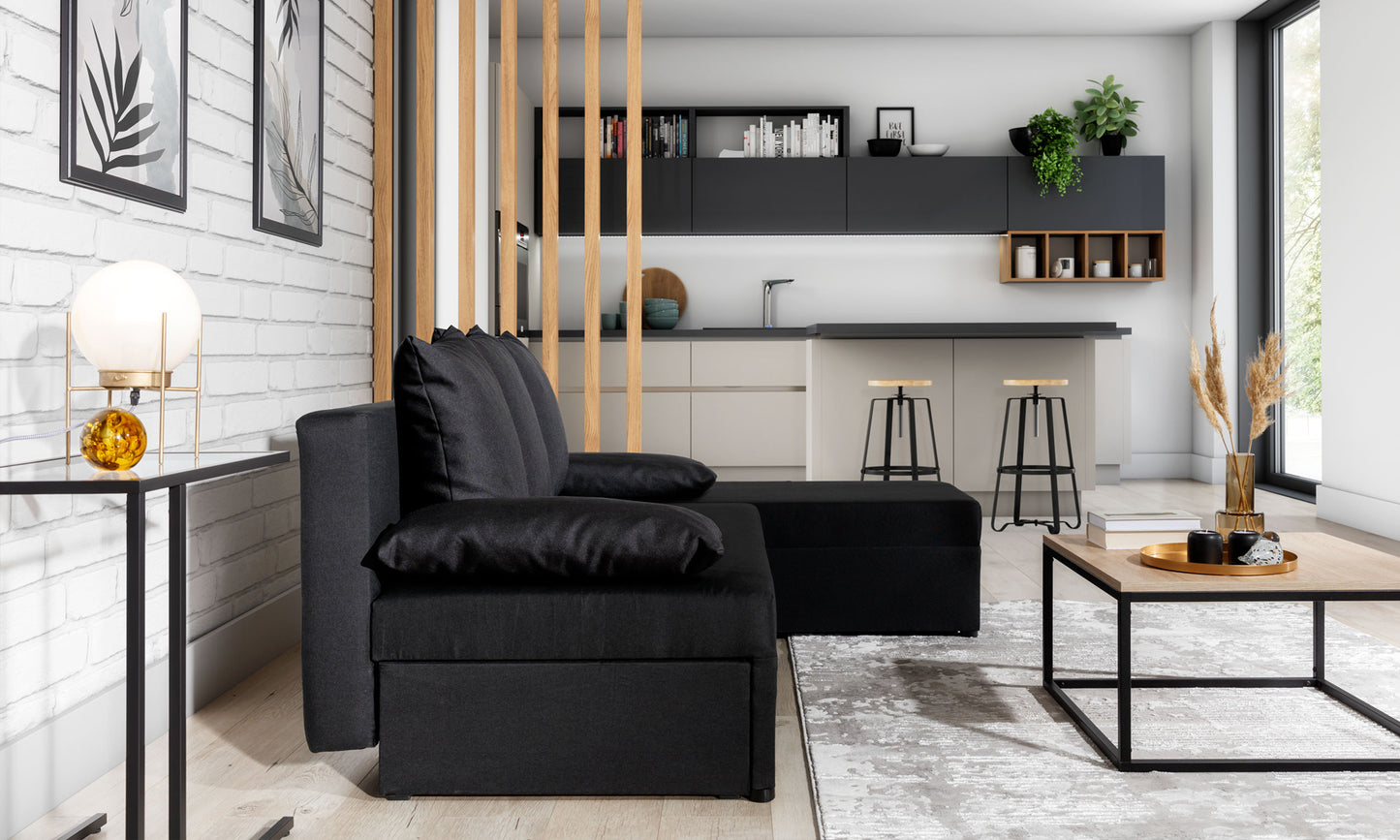 Narożnik Gino w kolorze Sawana 14 czarny, widok z boku w nowoczesnym salonie z jasnymi ścianami i drewnianymi elementami wystroju.