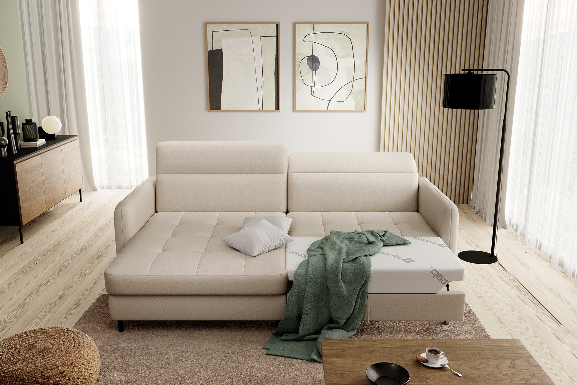 Narożnik Gomsi Manhattan 18 jasnobeżowy rozłożony do spania – wysunięty materac z poduszką i zielonym kocem, pokazujący funkcję spania.