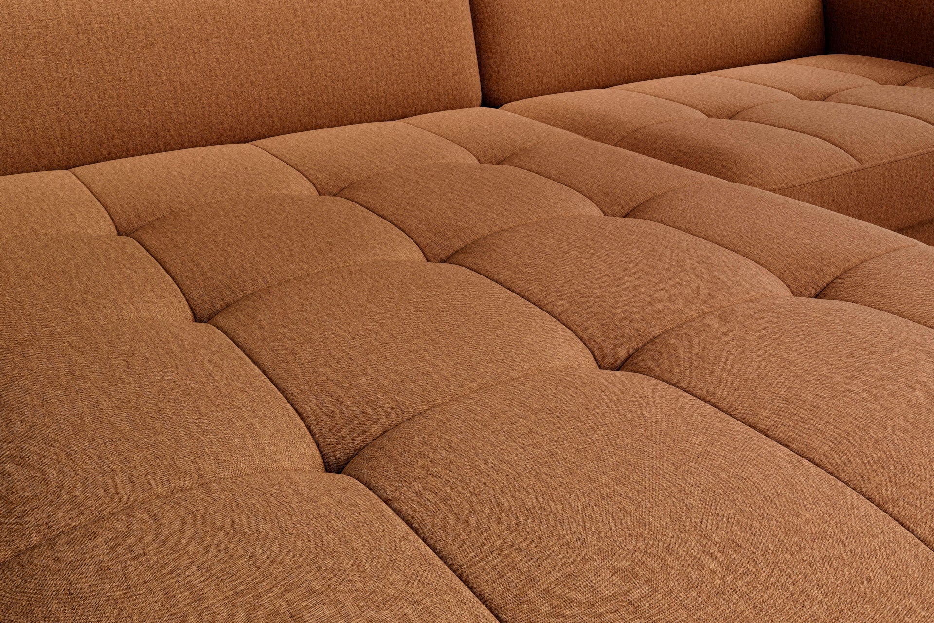 Zbliżenie na pikowane siedzisko – detal przeszyć tkaniny narożnika Gomsi Manhattan 45 żółty, regularne kwadratowe panele i faktura materiału.