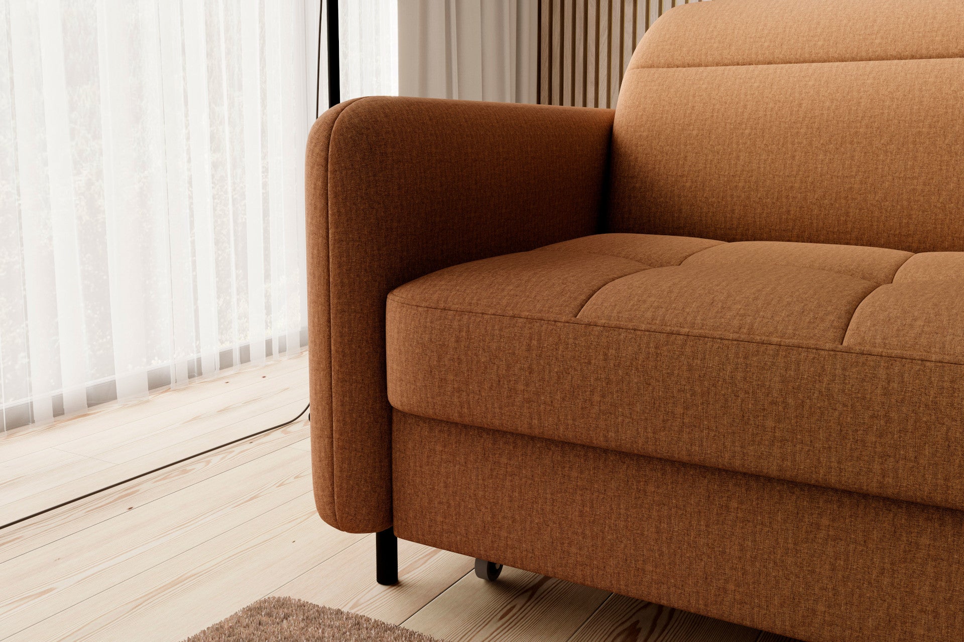 Zbliżenie na nóżkę i krawędź siedziska – widok detalu smukłej czarnej metalowej nóżki narożnika Gomsi Manhattan 45 żółty (układ lewy) oraz pikowanej krawędzi siedziska na tle jasnej drewnianej podłogi.