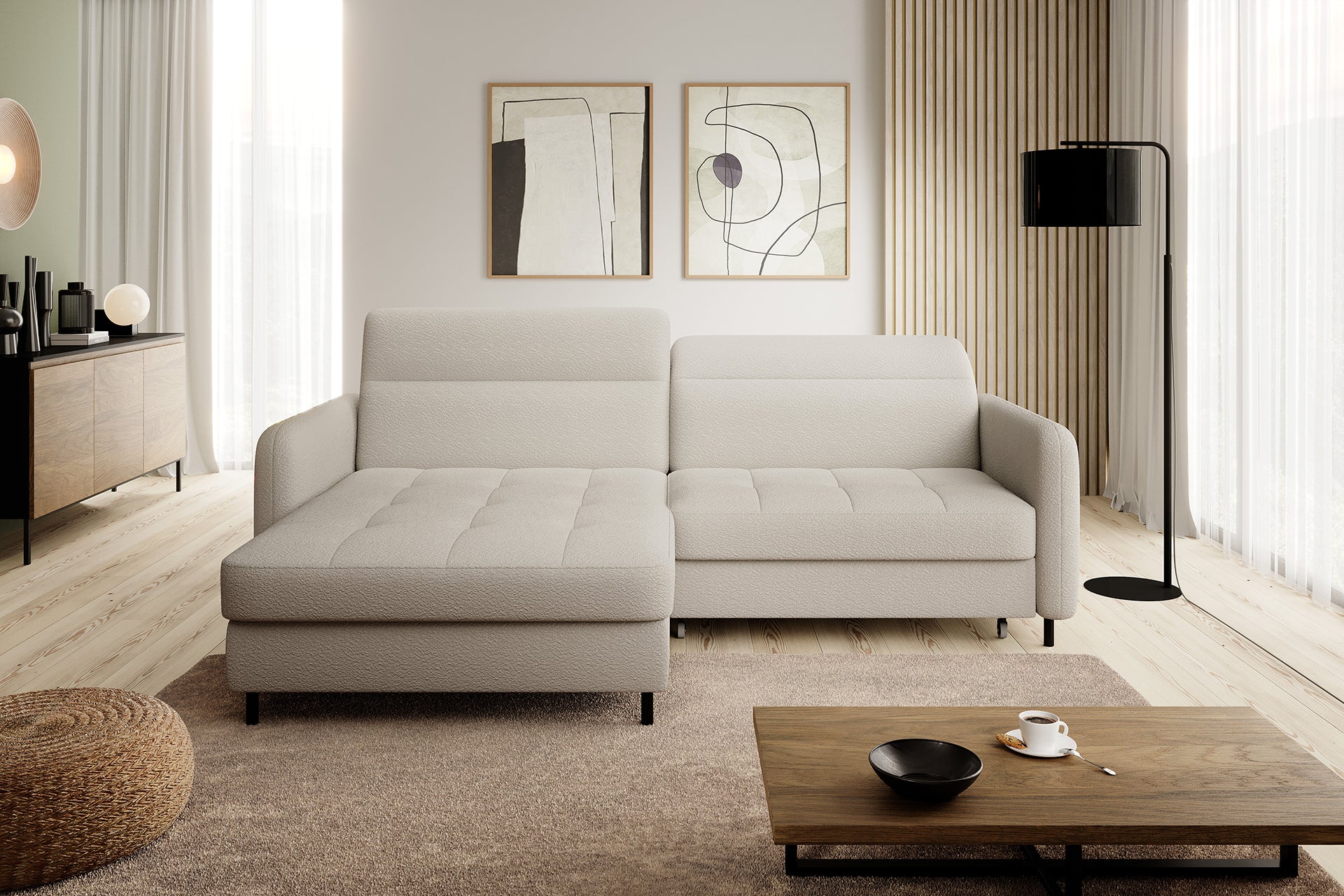 Narożnik Gomsi Royal 18 beżowy w jasnym, nowoczesnym salonie przy dużym oknie i komodzie, układ lewy.