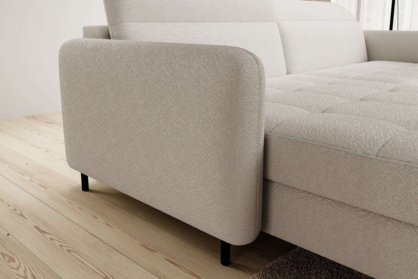 Zbliżenie na zaokrąglony podłokietnik narożnika Gomsi Royal 18 beżowego, miękka tkanina boucle.