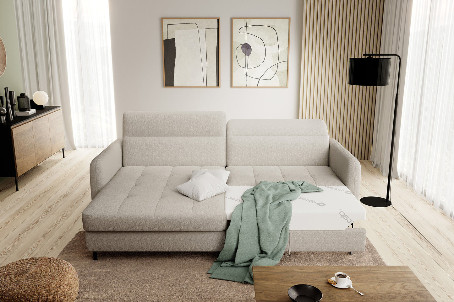 Narożnik Gomsi Royal 18 beżowy z wysuniętym szezlongiem w trybie spania, z poduszką i narzutą.