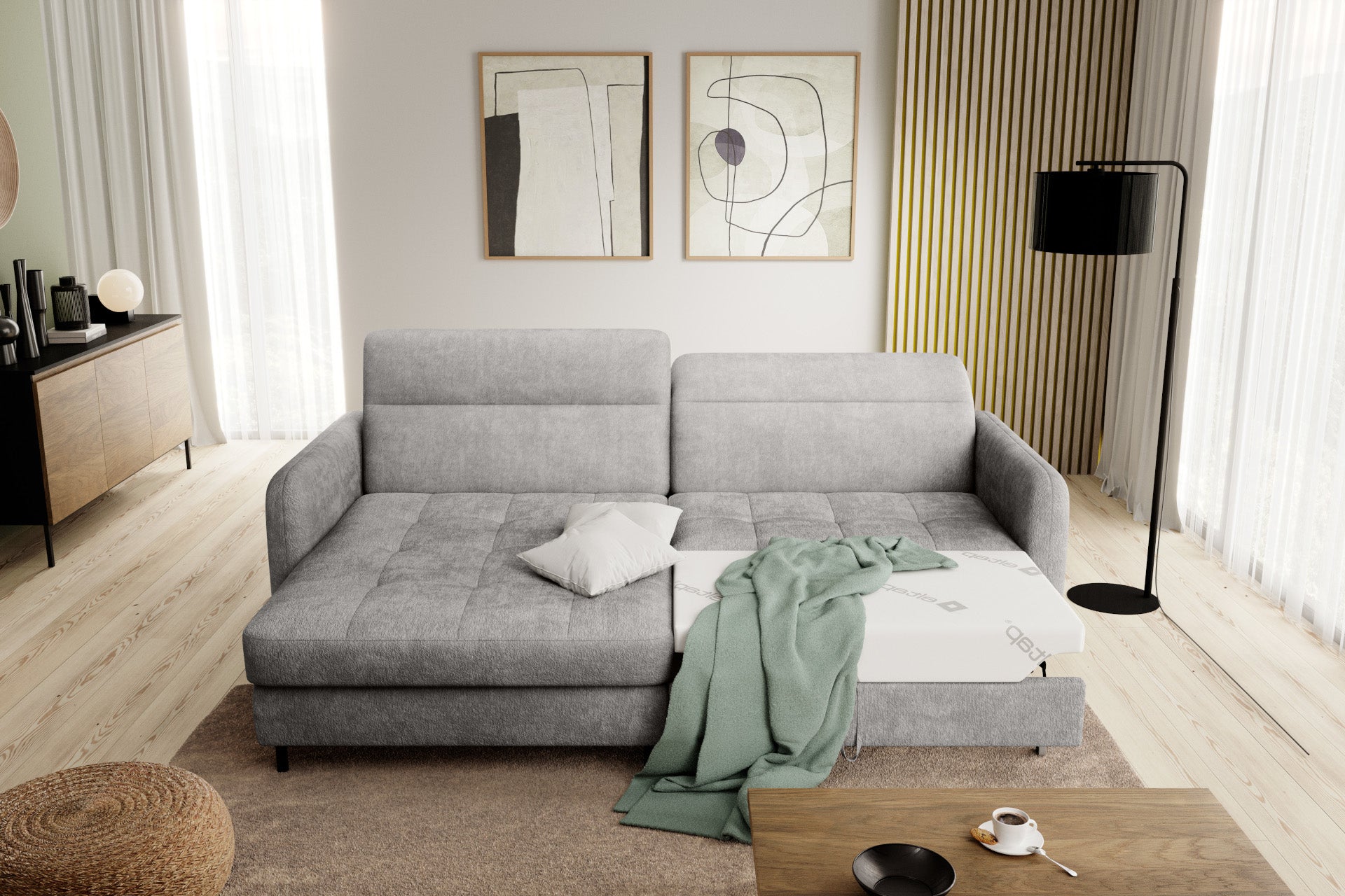 Narożnik Gomsi Raquel 03 jasnoszary w układzie lewym rozłożony na funkcję spania, z widocznym mechanizmem wysuwania i wyciąganą szufladą ze schowkiem.