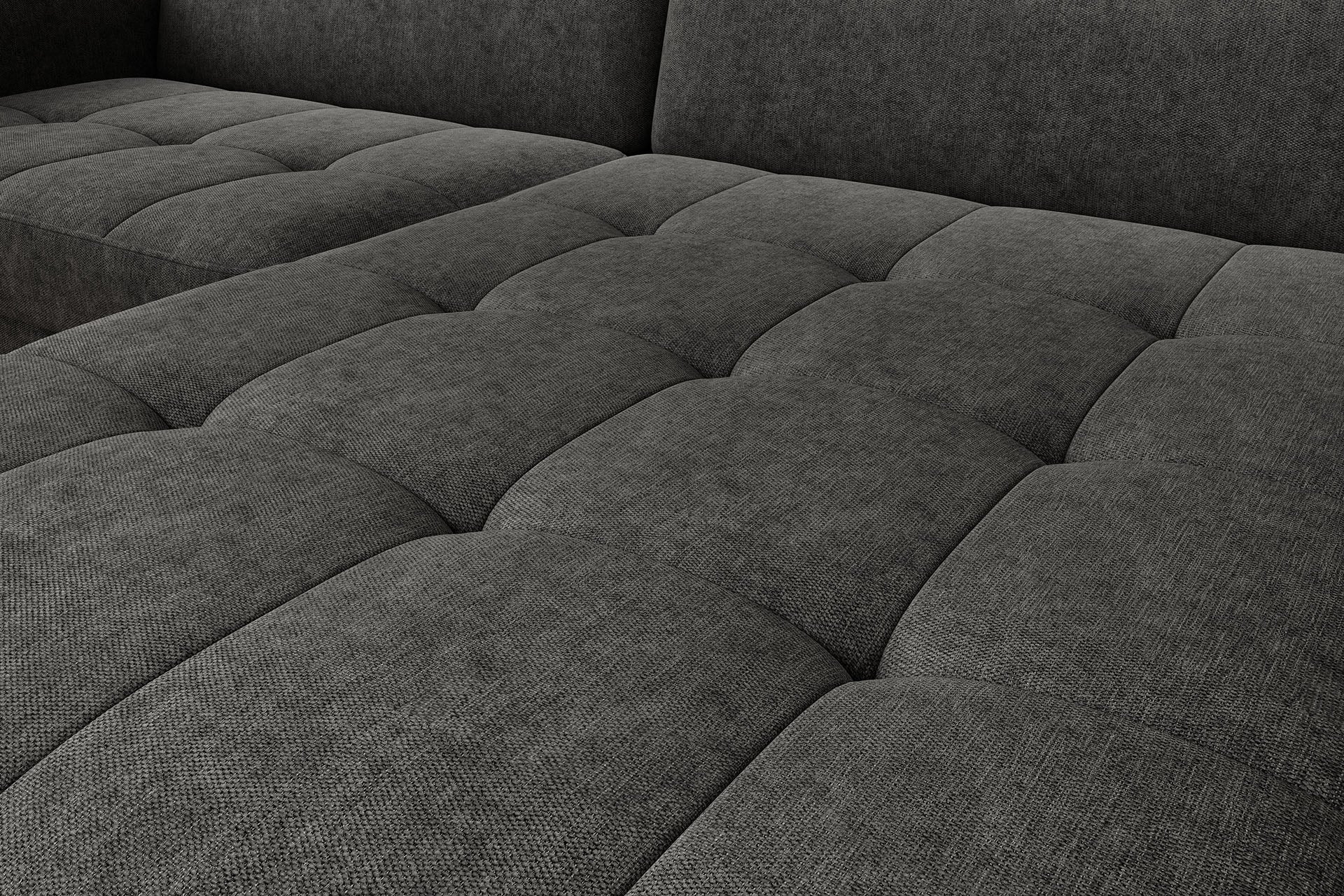 Zbliżenie na pikowane siedzisko narożnika Gomsi Raquel 05 w układzie prawym, uwypuklające geometryczne przeszycia tkaniny.