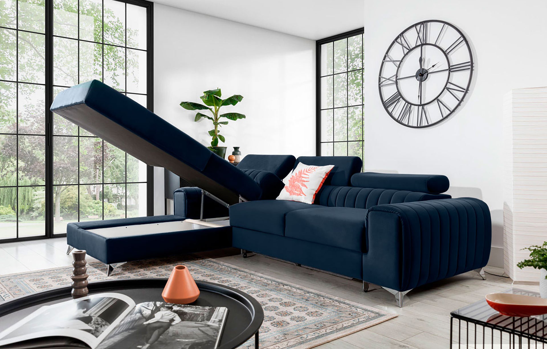 Narożnik Grayson Monolith 79 niebieski z otwartym pojemnikiem na pościel – praktyczny szezlong w układzie lewym.