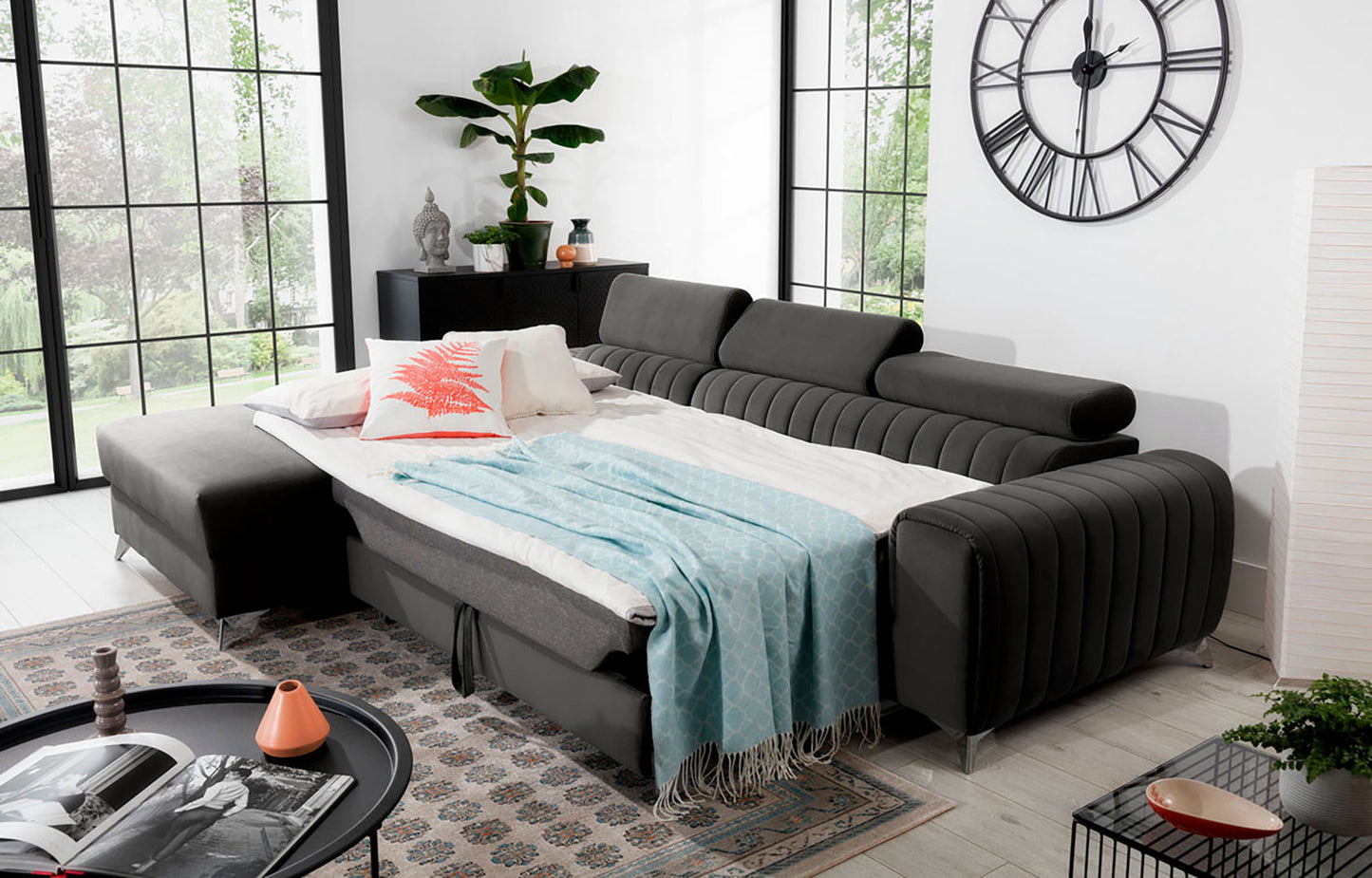 Narożnik Grayson Nube 05 ciemnoszary rozłożony do funkcji spania – wygodne łóżko w eleganckiej aranżacji wnętrza.