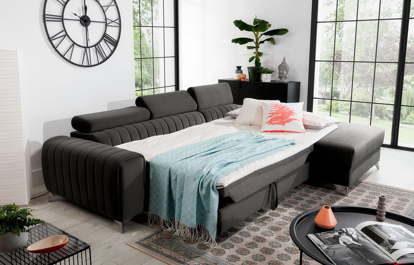 Narożnik Grayson Nube 05 ciemnoszary rozłożony do funkcji spania – komfortowa powierzchnia do snu w eleganckiej aranżacji wnętrza.