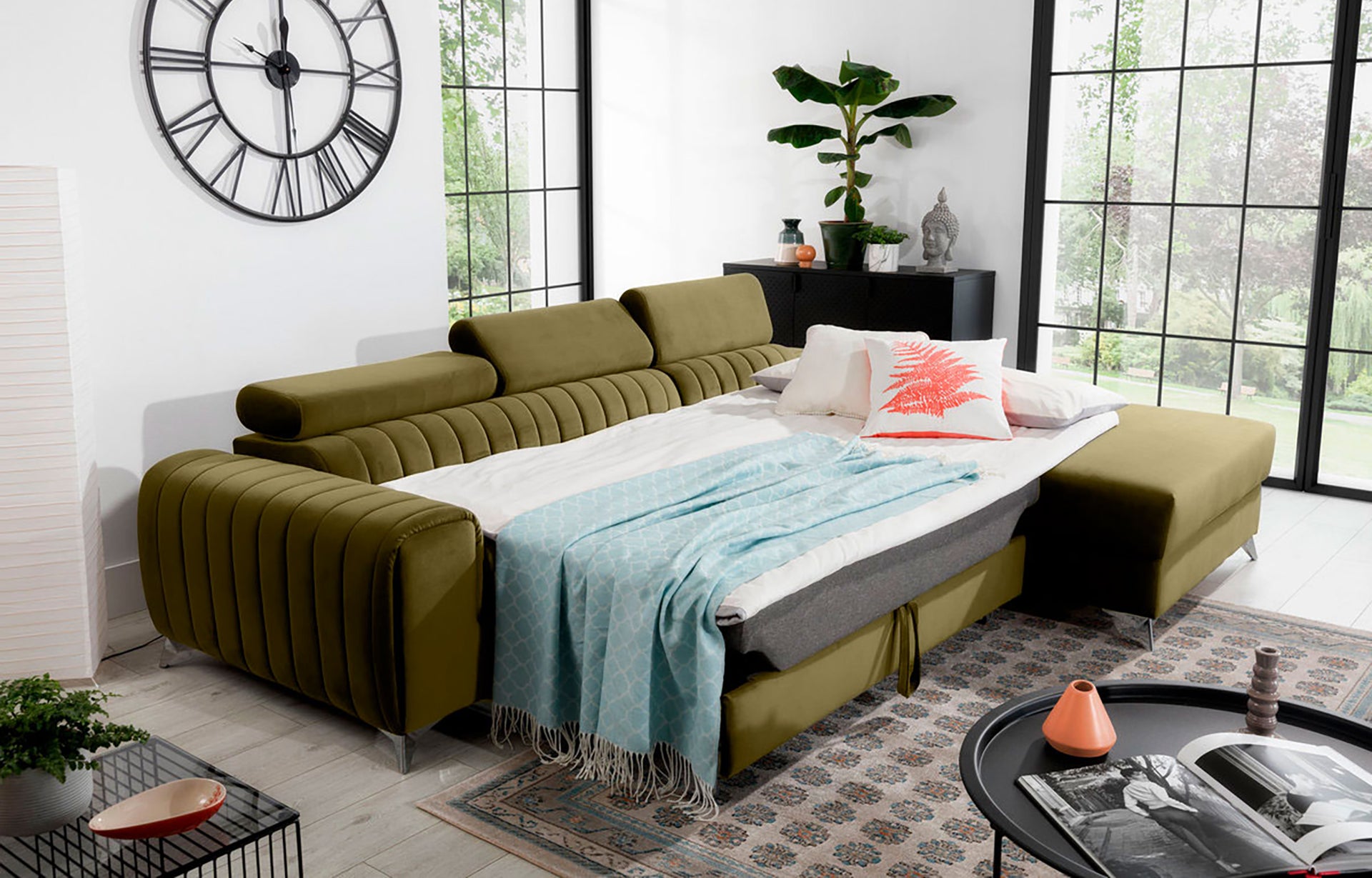 Narożnik Grayson Nube 33 jasnozielony rozłożony do funkcji spania – komfortowa powierzchnia do snu w eleganckiej aranżacji wnętrza.
