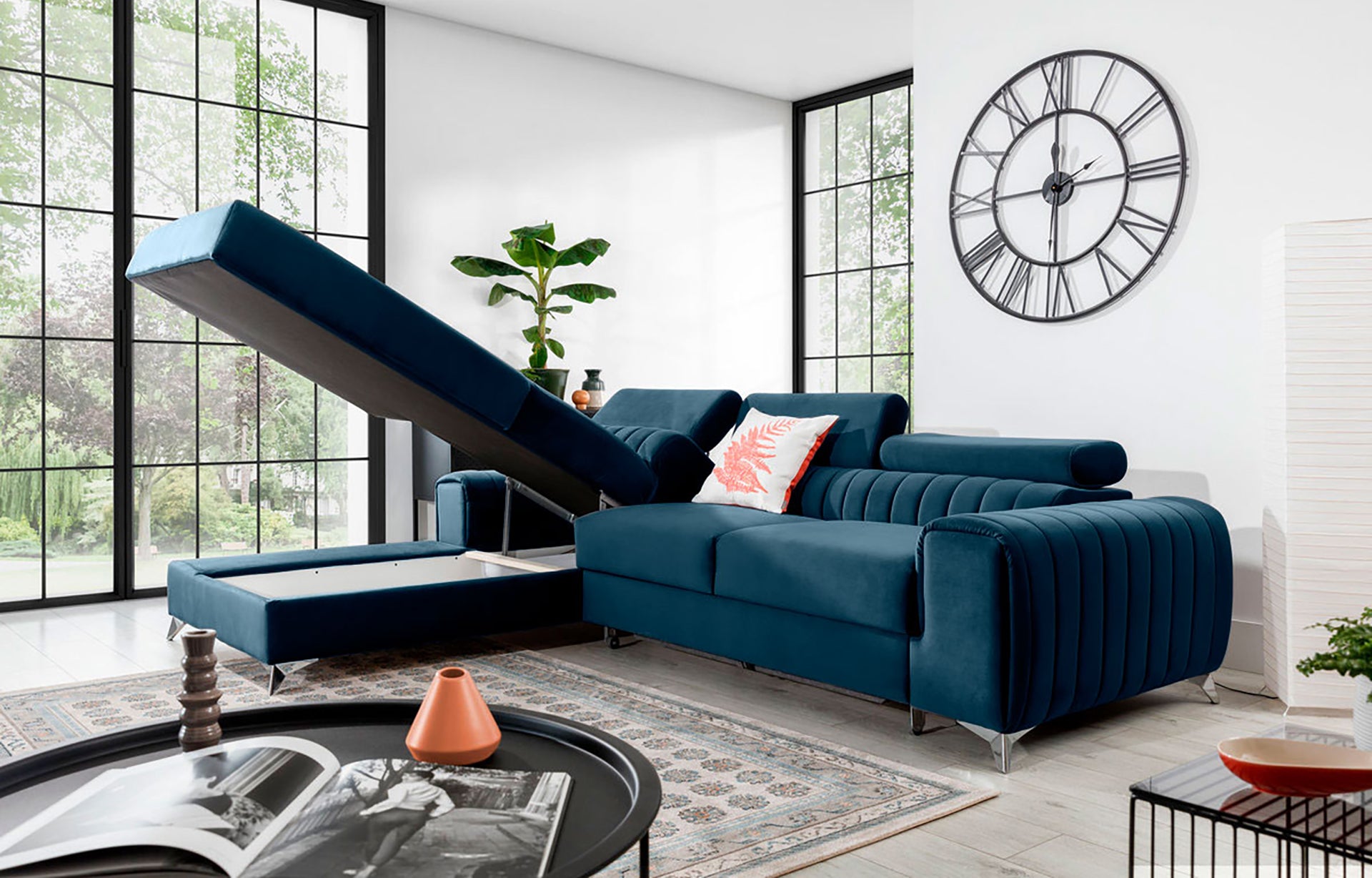 Narożnik Grayson Nube 40 granatowy z otwartym pojemnikiem na pościel – praktyczny szezlong w układzie lewym.