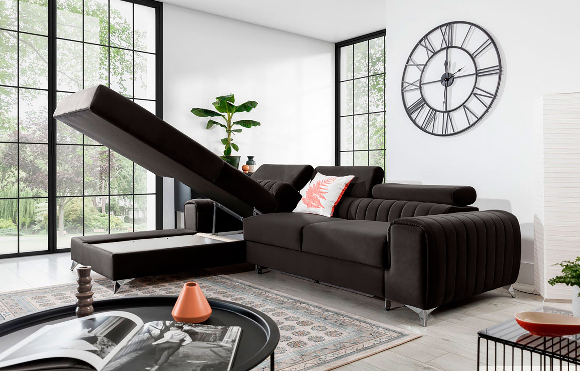 Narożnik Grayson Riviera 97 ciemnoszary z otwartym pojemnikiem na pościel – funkcjonalny szezlong w układzie lewym.