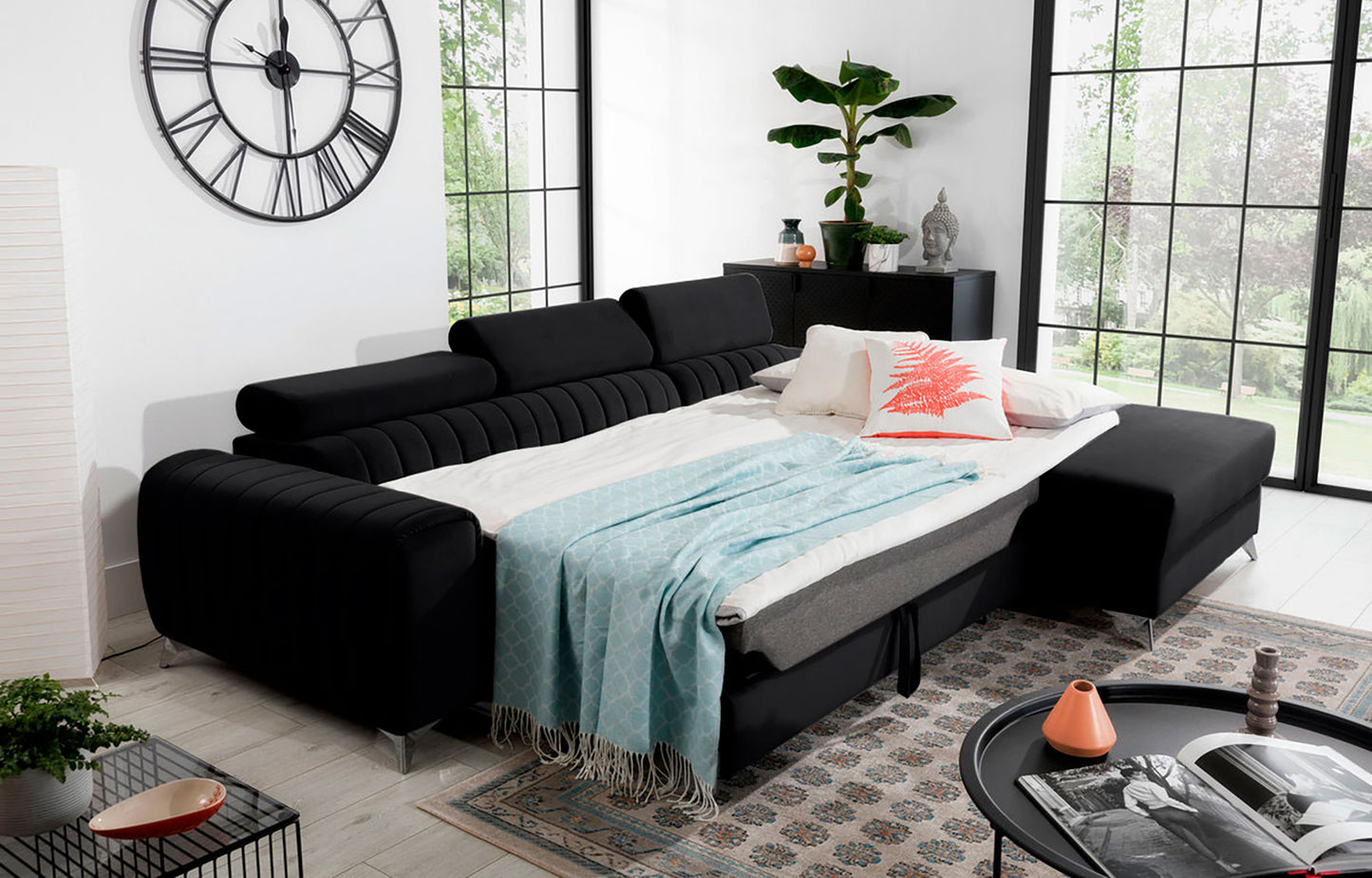 Narożnik Grayson Velvetmat 10 czarny rozłożony do funkcji spania – komfortowa powierzchnia do snu w eleganckiej aranżacji wnętrza.