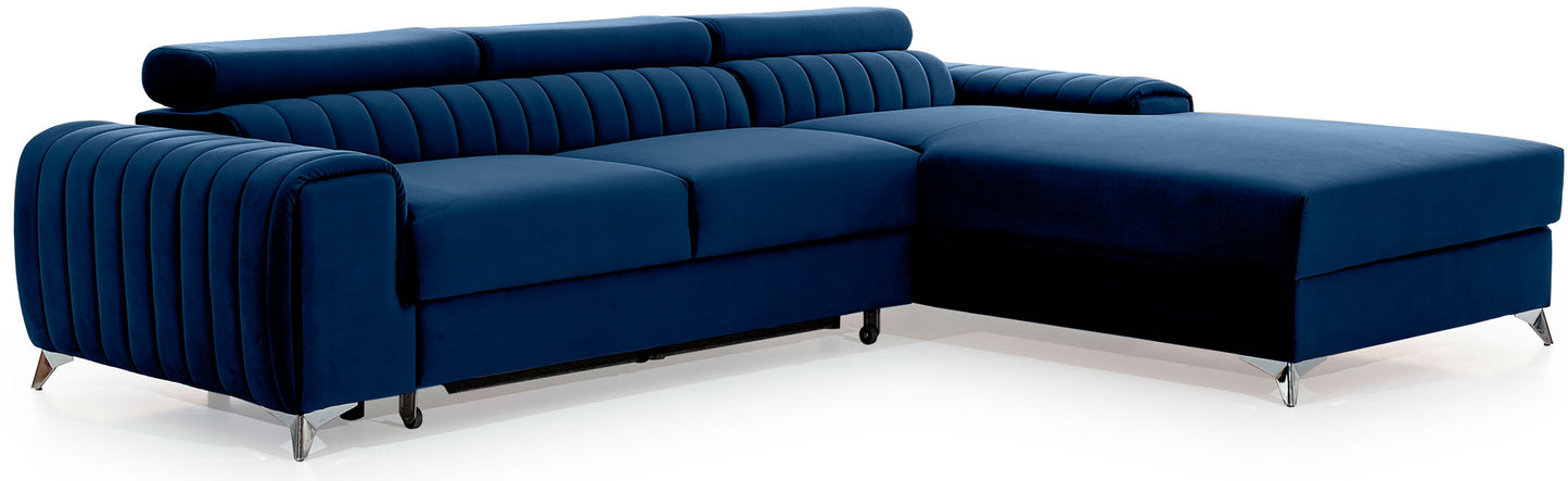 Narożnik Grayson Nube 40 granatowy, układ prawy – widok z boku, ozdobne pionowe przeszycia i chromowane nóżki w nowoczesnym stylu.