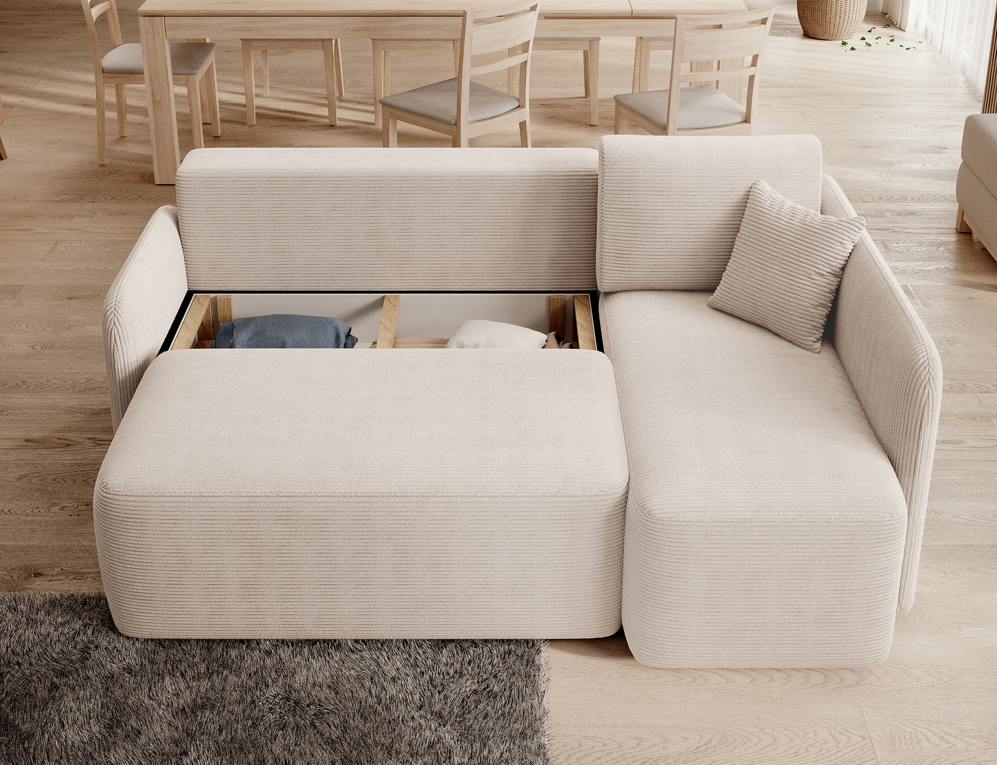 Narożnik z funkcją przechowywania – pojemnik na pościel ukryty pod szezlongiem.