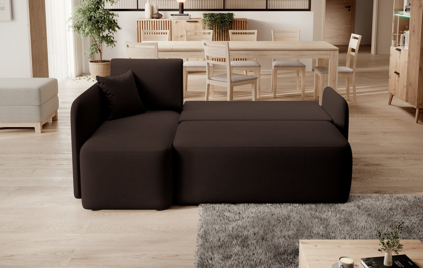 Pojemnik na pościel w narożniku Hadson w kolorze ciemnobrązowym, otwarty i wypełniony tekstyliami.