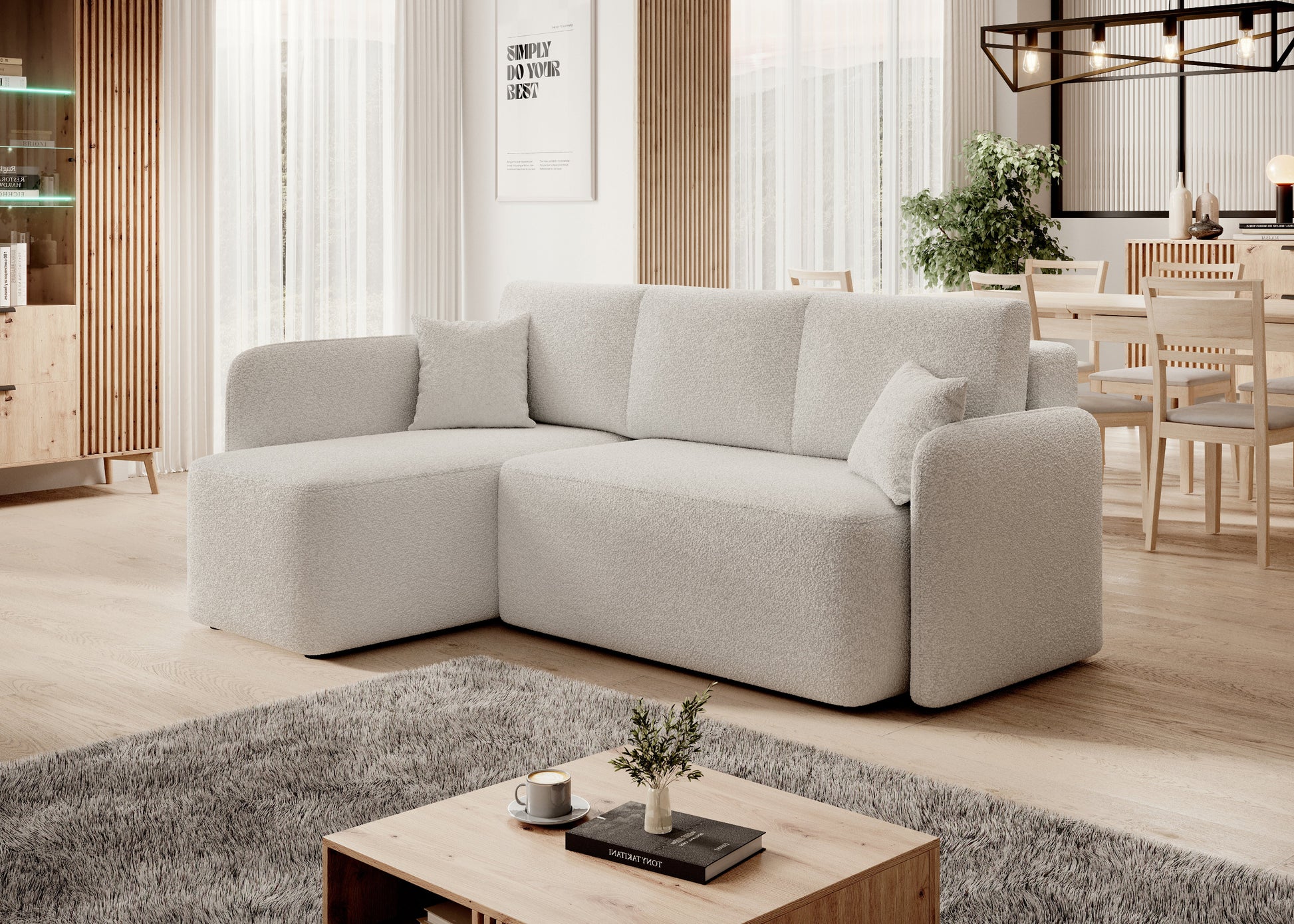 Narożnik z szezlongiem w nowoczesnym salonie z jasnymi zasłonami i stolikiem kawowym.