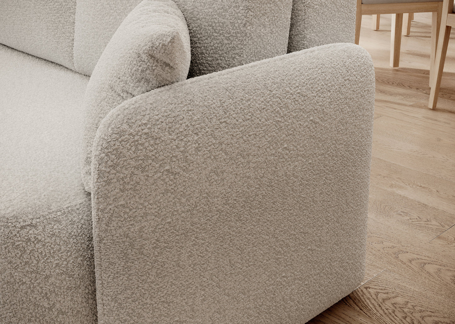 Zaokrąglony podłokietnik narożnika z miękką tapicerką – detal w stylu Home and Garden.