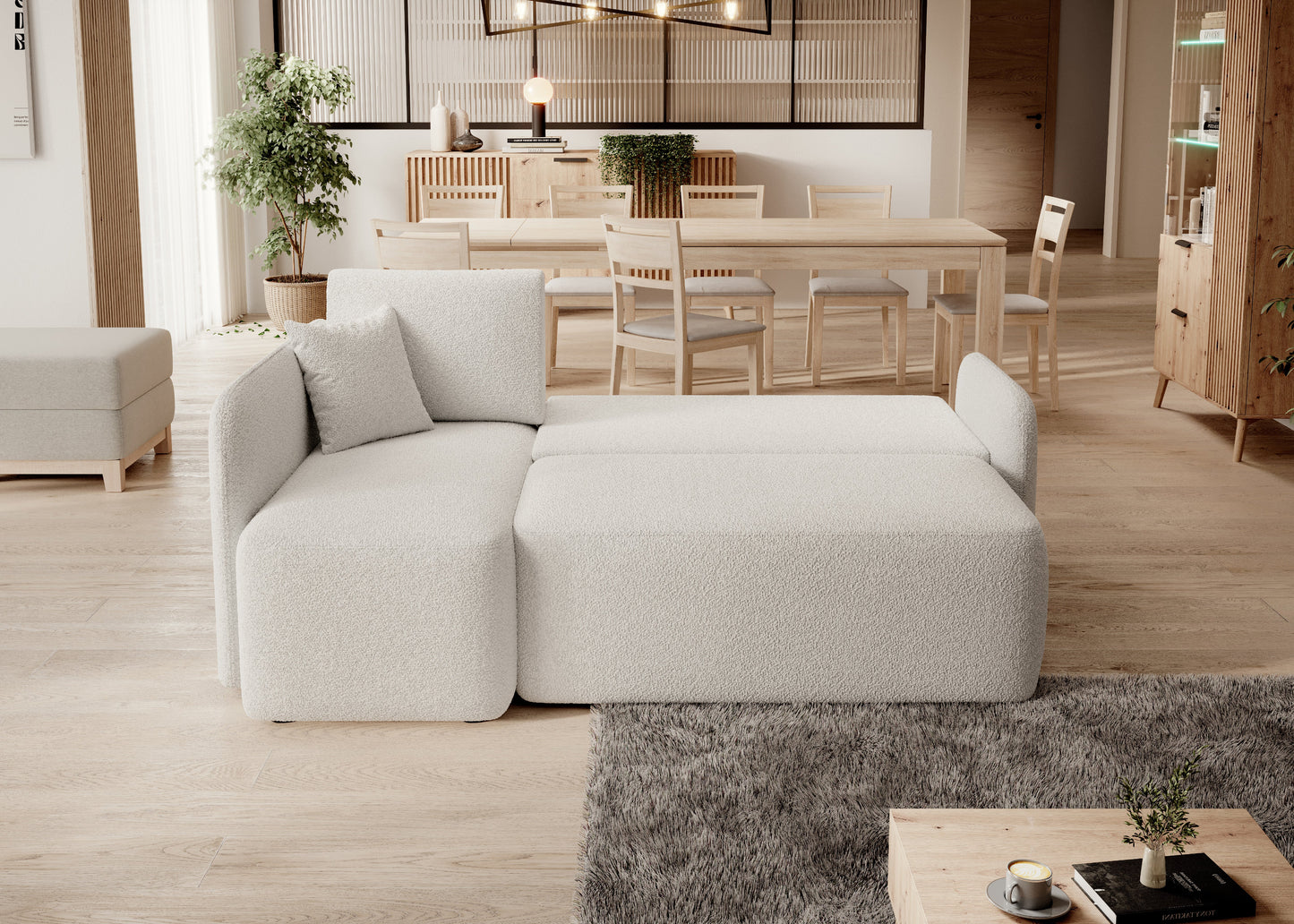 Jasny narożnik w strefie dziennej z dodatkami – elegancja i funkcjonalność w jednym.