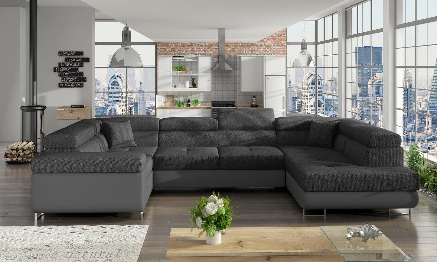 Narożnik Letto modułowy w tkaninie Inari 96 ciemnoszary z szarą podstawą Soft 29 w nowoczesnym salonie