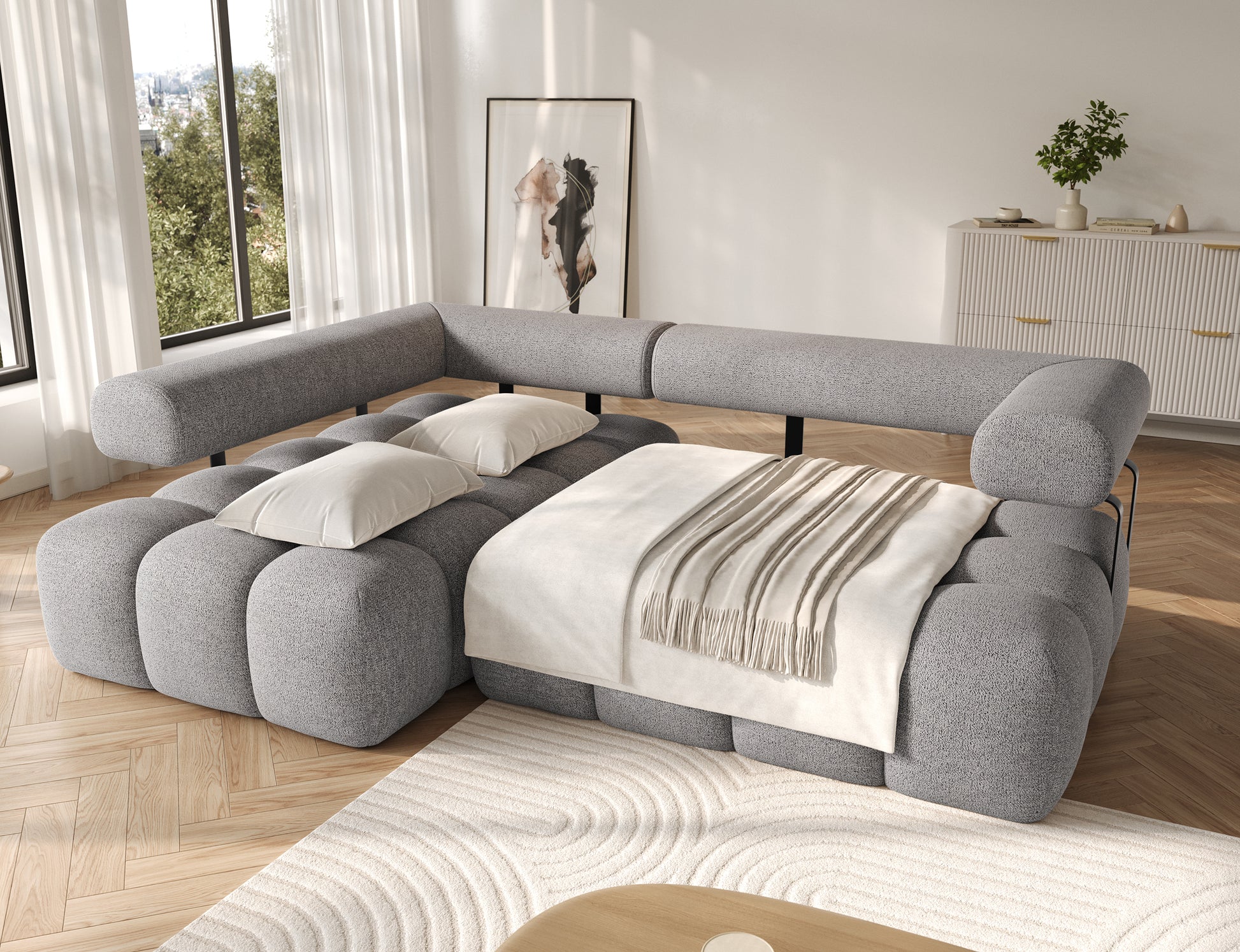 Narożnik Levvi lewy ELTAP w tkaninie Coralline 03 szaro-czarny boucle rozłożony do funkcji spania Relax, widoczne posłanie