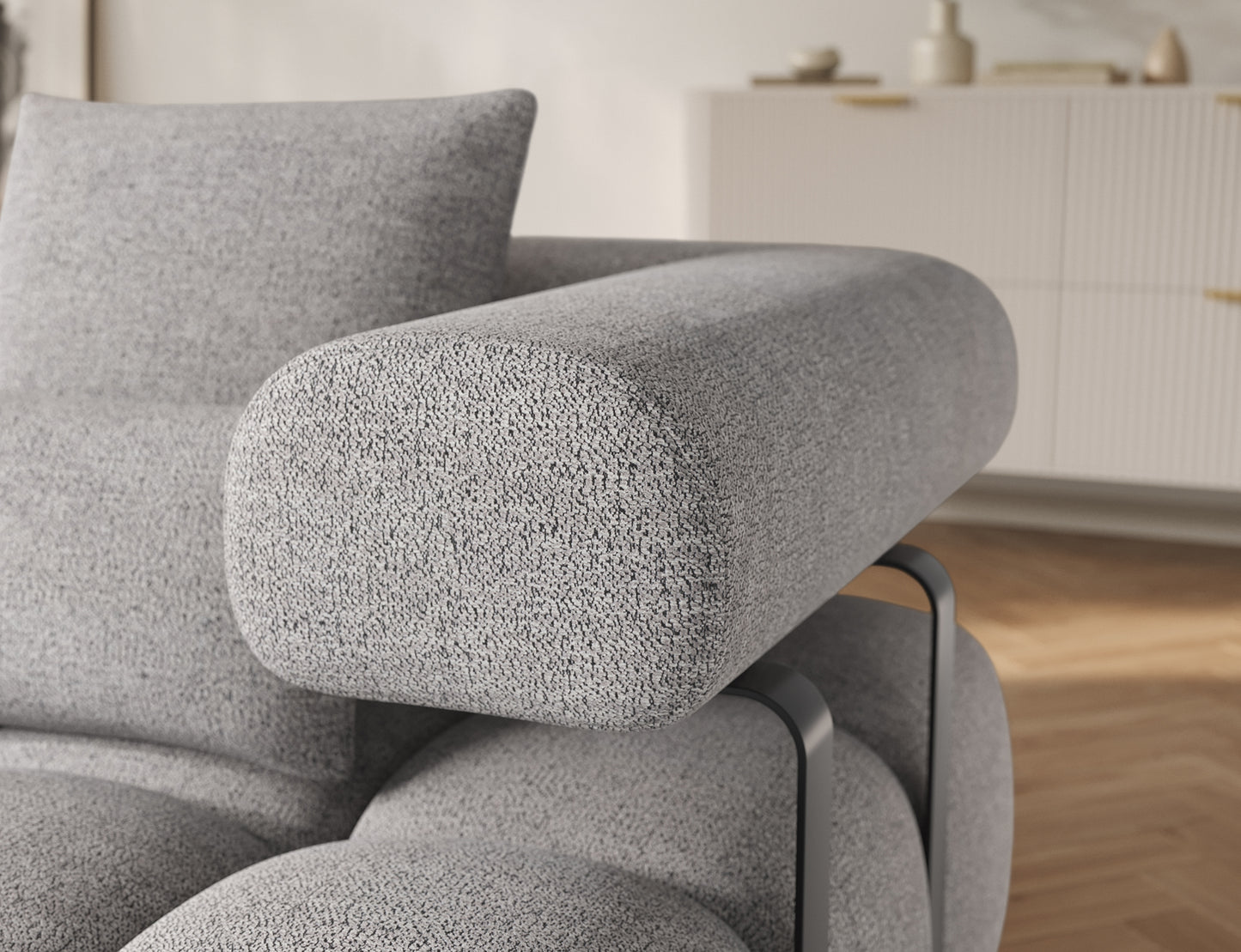 Zbliżenie na podłokietnik narożnika Levvi lewy ELTAP w tkaninie Coralline 03 szaro-czarny boucle z eleganckim metalowym stelażem